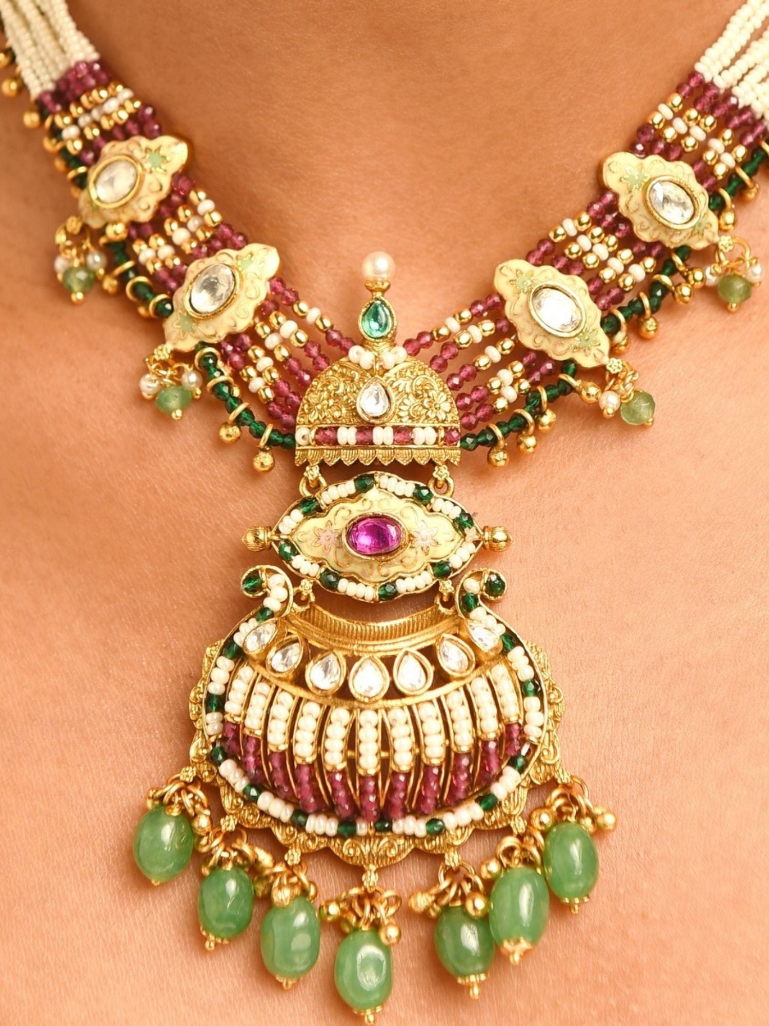 Gold plated antique bridal jewellery set necklace with large pendant, green bead drops, ruby and kundan detailing