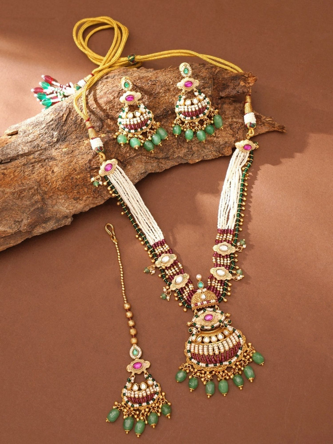 Abdesignsjewellery gold plated antique bridal jewellery set necklace with green stone drops and matching earrings on model