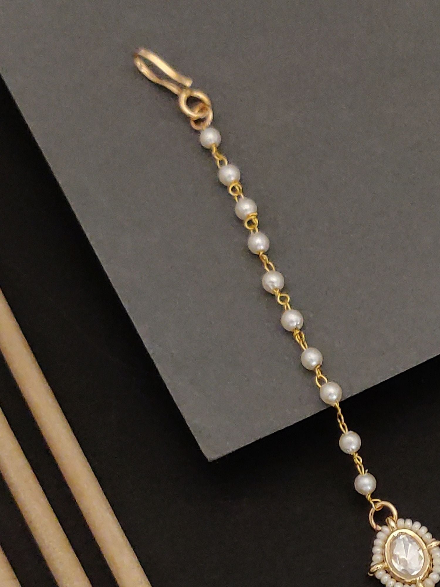 Gold plated bridal polki maangtikka with pearl chain and intricate design by Abdesignsjewellery