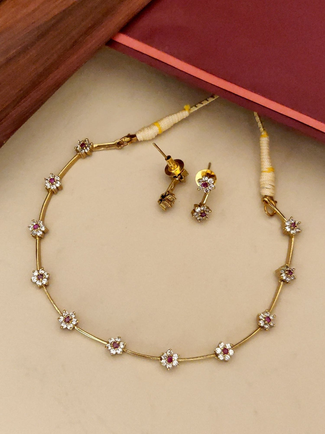 Abdesignsjewellery gold plated floral necklace set with dainty flower charms and matching stud earrings