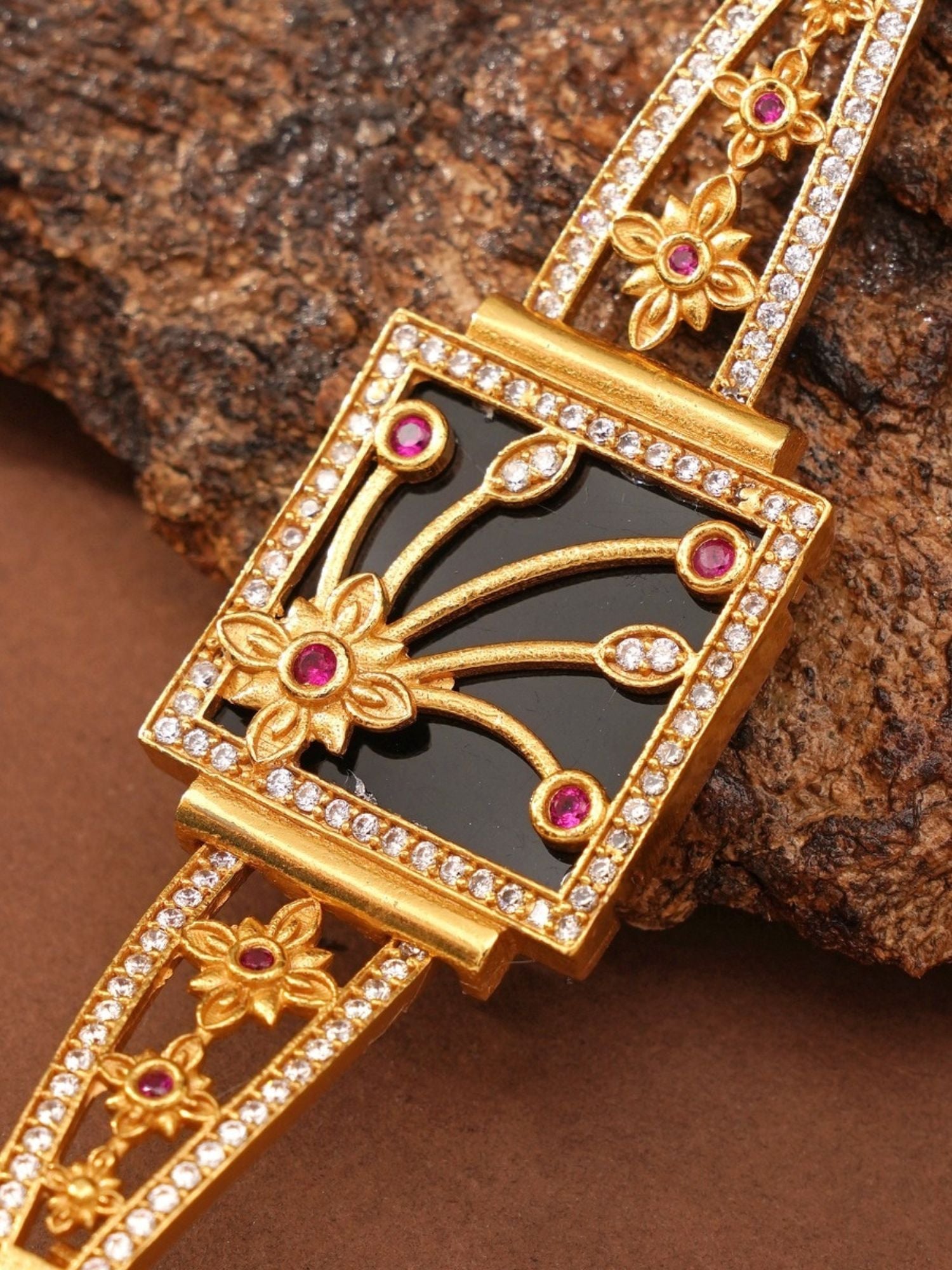 Abdesignsjewellery gold plated mother of pearl bracelet with square black inlay floral design and ruby accents