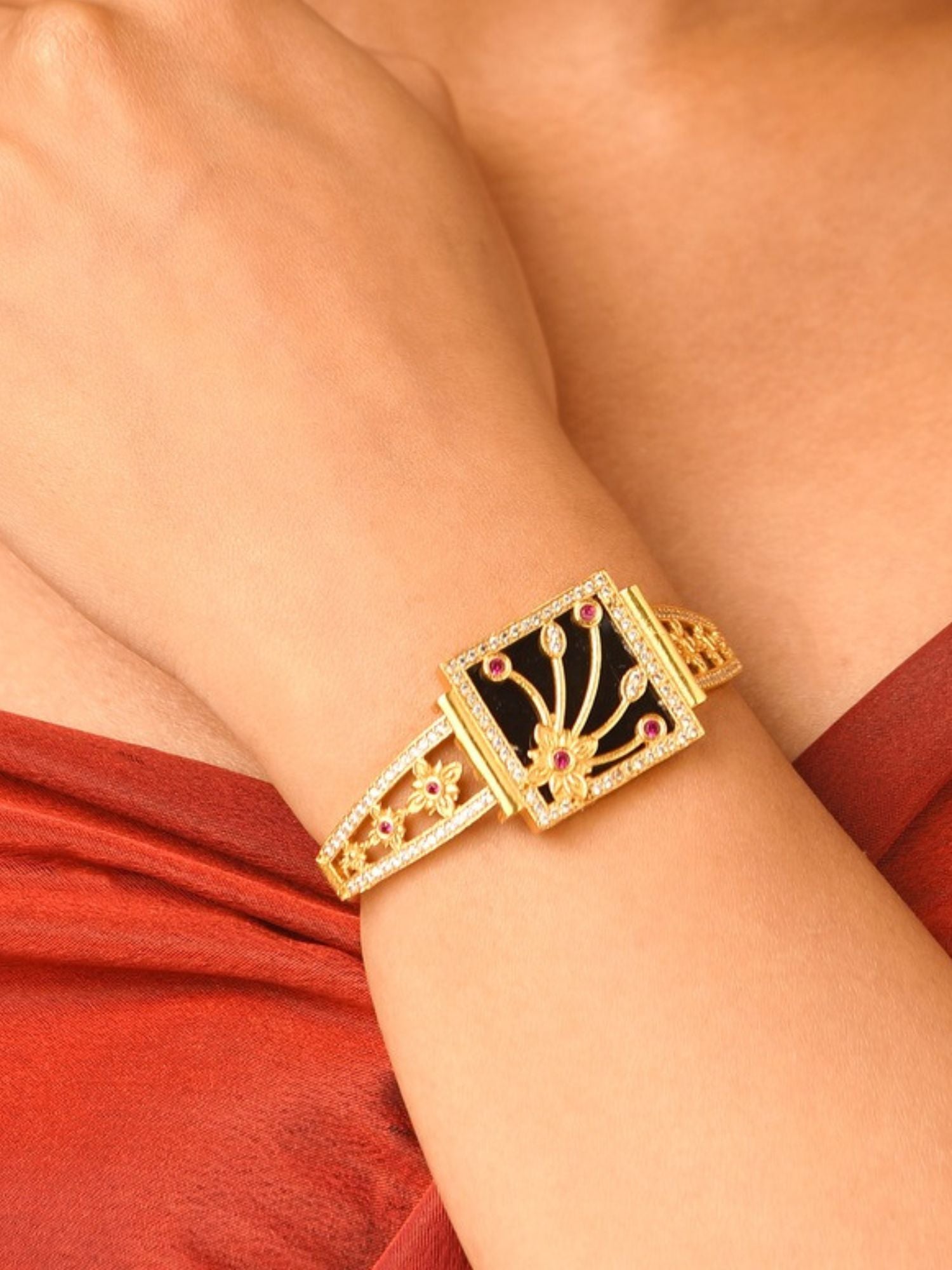 Abdesignsjewellery gold plated mother of pearl bracelet with black enamel square center and ruby accents