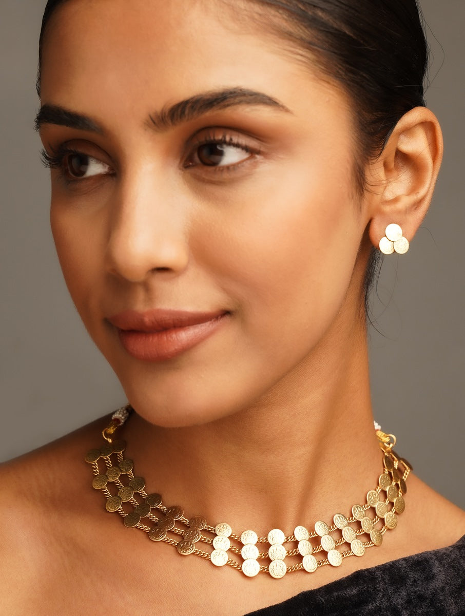 Golden Plated Matt Finish Temple Necklace Set by Abdesignsjewellery worn by woman with matching earrings