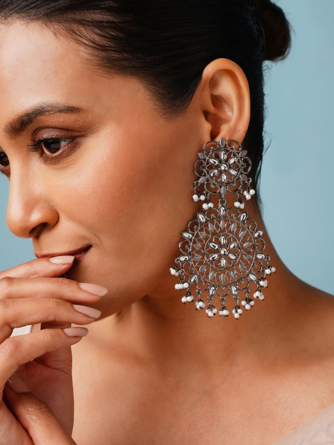 High Quality German Silver Plated Pearl Earring featuring intricate floral design worn by model