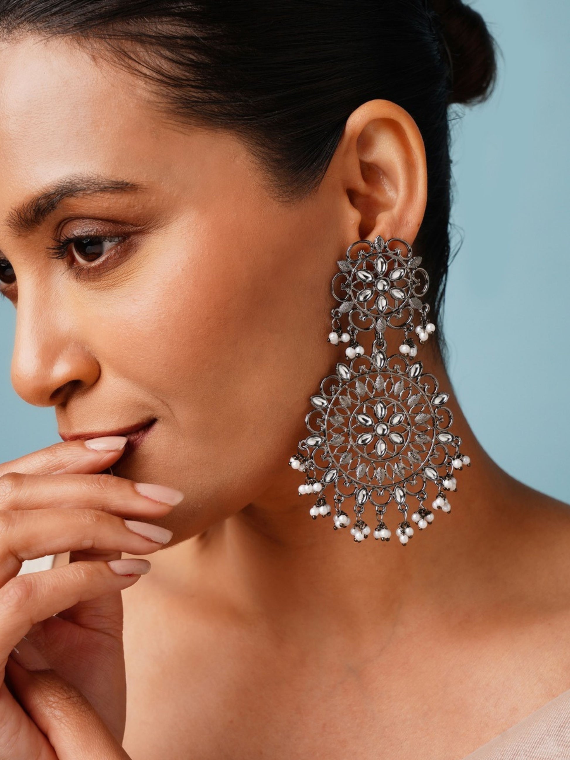 High Quality German Silver Plated Pearl Earring featuring intricate floral design worn by model