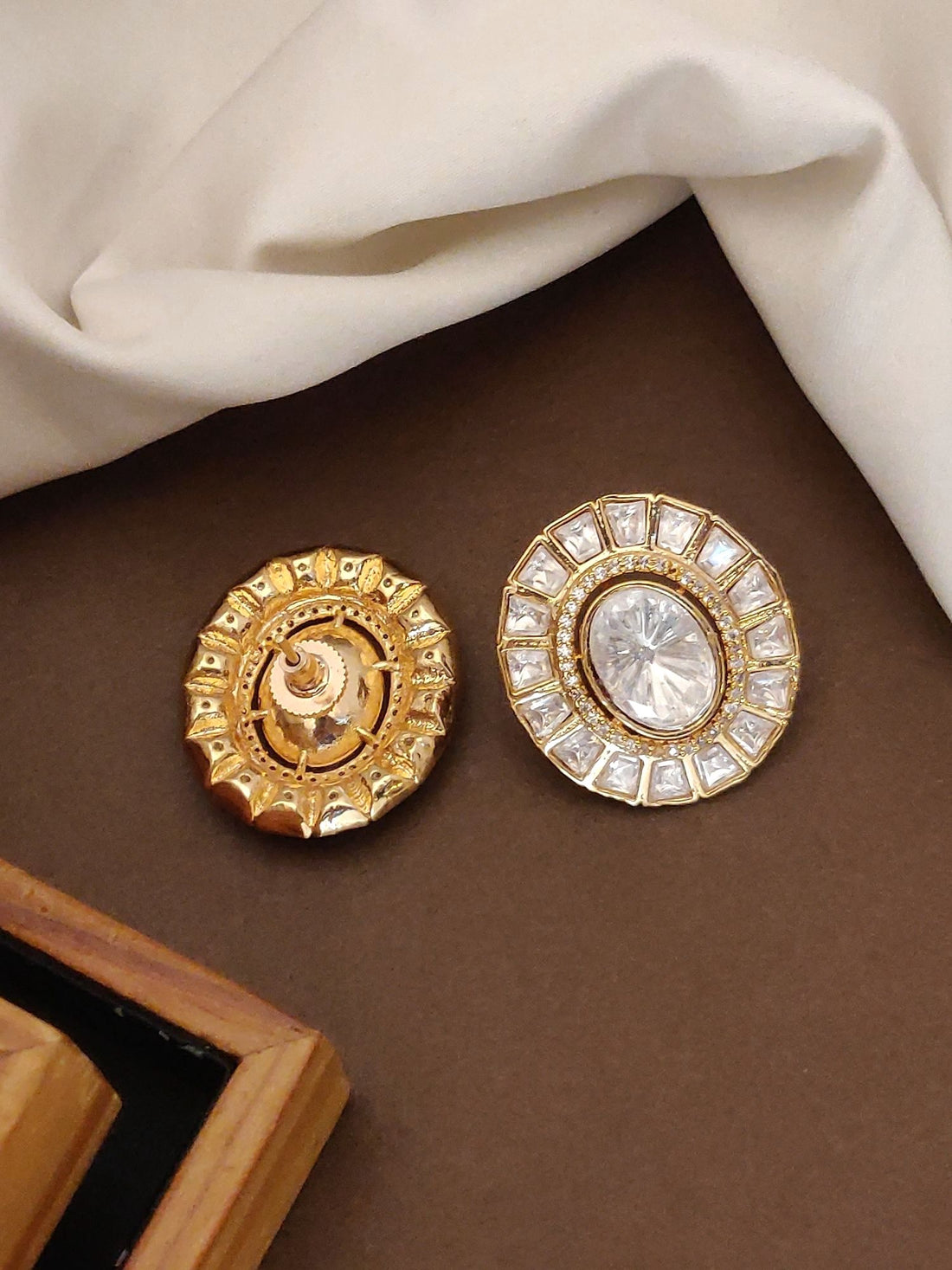 High Quality Gold Plated Polki Studs Earring pair of round gold plated polki studs with central oval stone and halo square stones