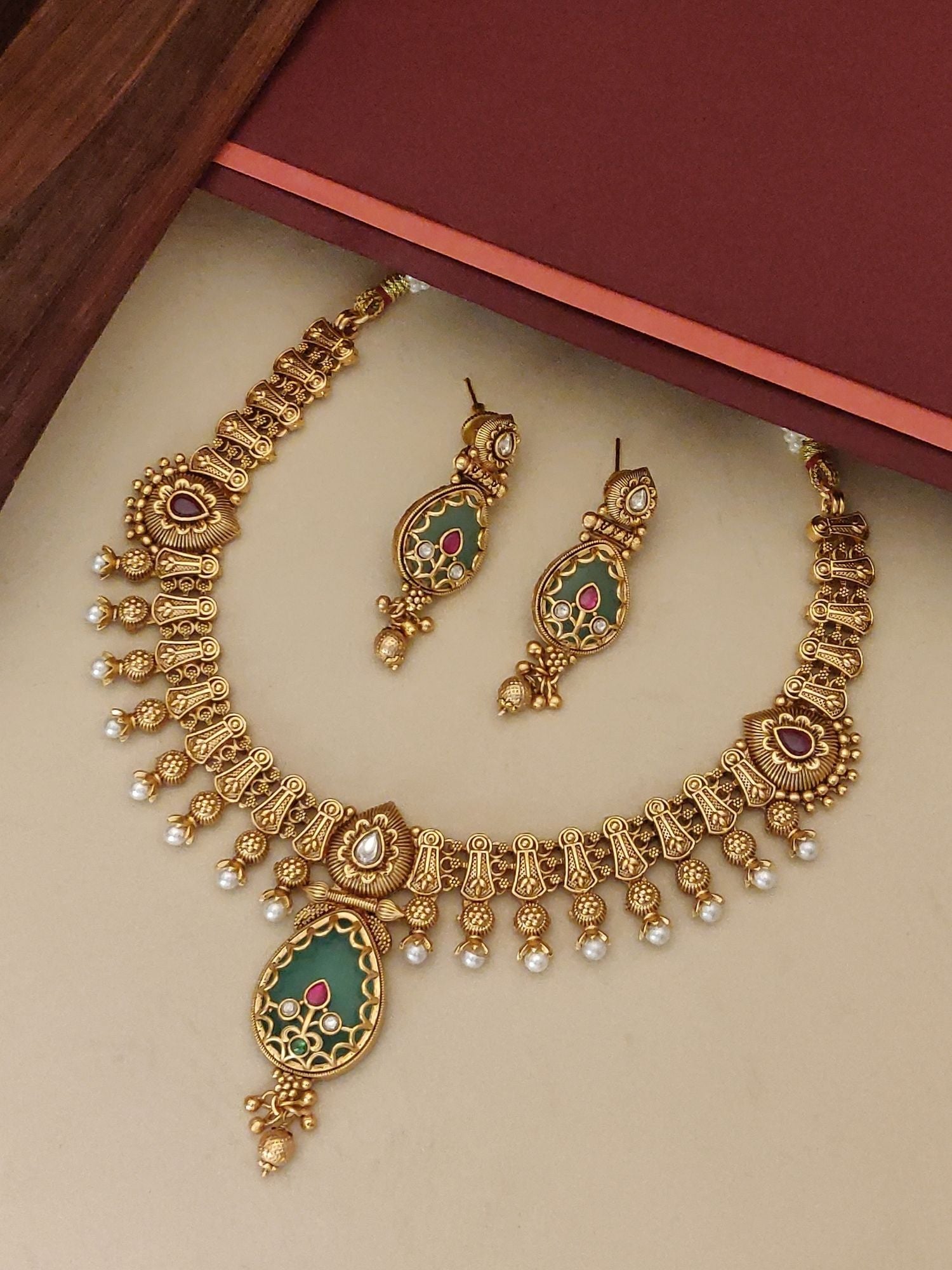 Imitation Necklace Set with Earrings featuring traditional design and colorful embellishments