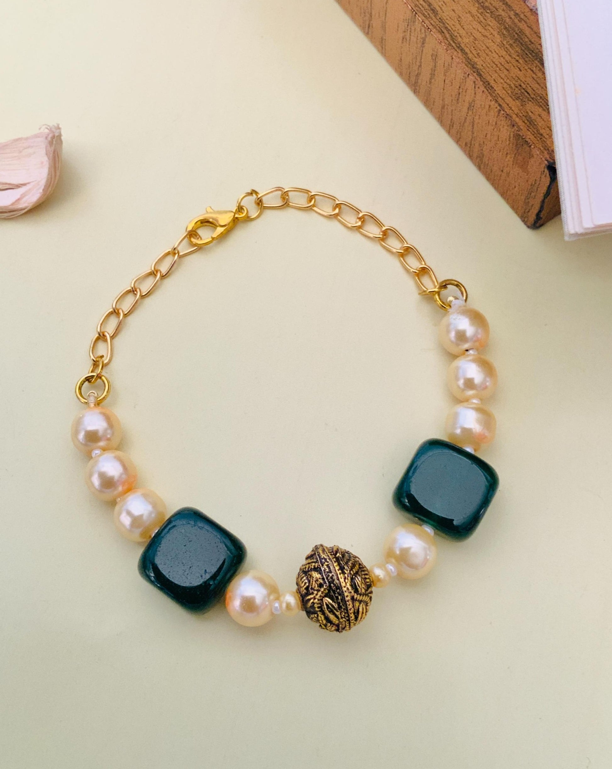 Jaipuri Beads Hand Bracelet by Abdesignsjewellery featuring white pearls, green beads, and gold chain