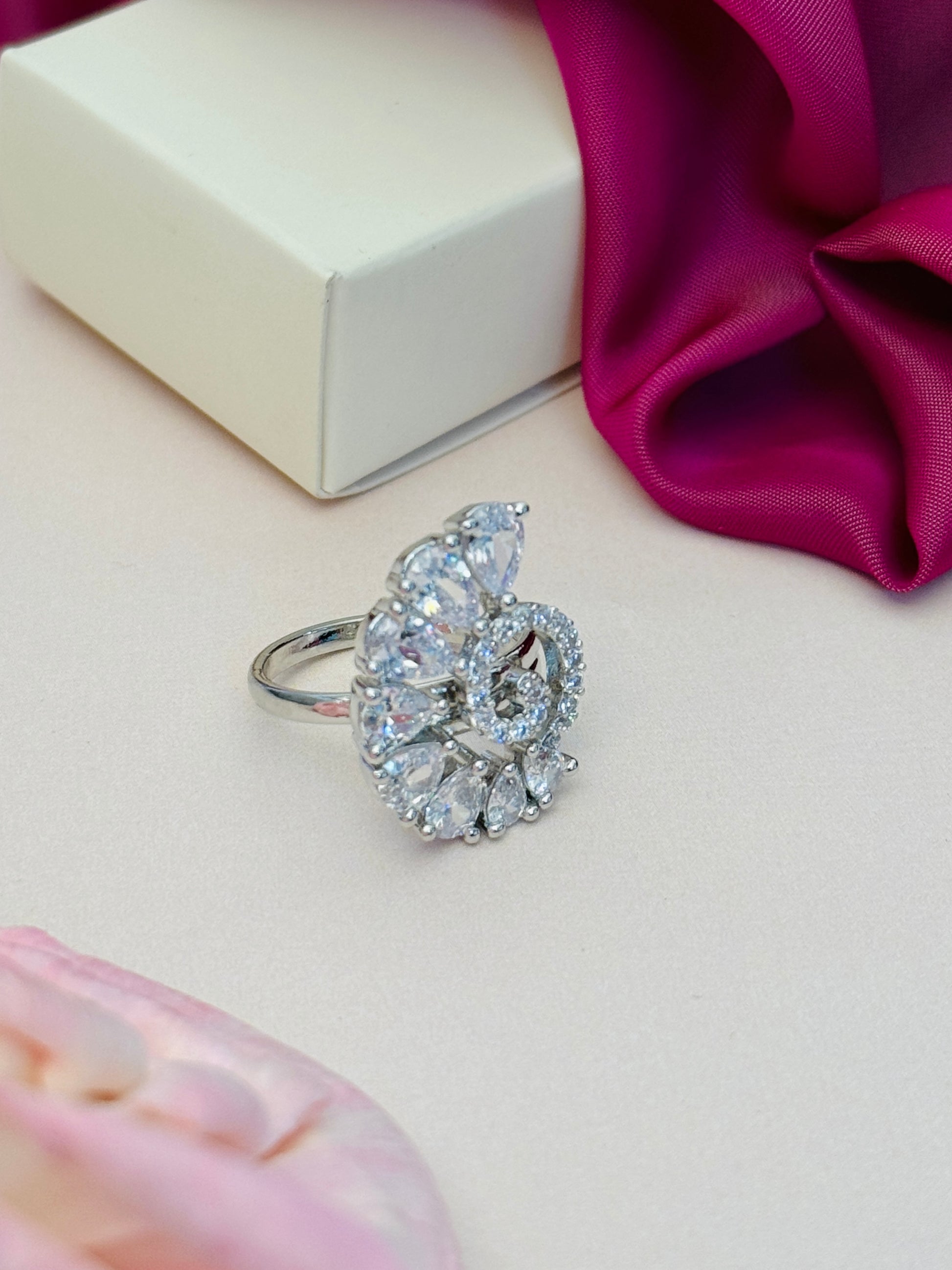 Abdesigns Jewellery Blue & Silver Stone Ring for Women displayed on a light surface with white box and pink fabric