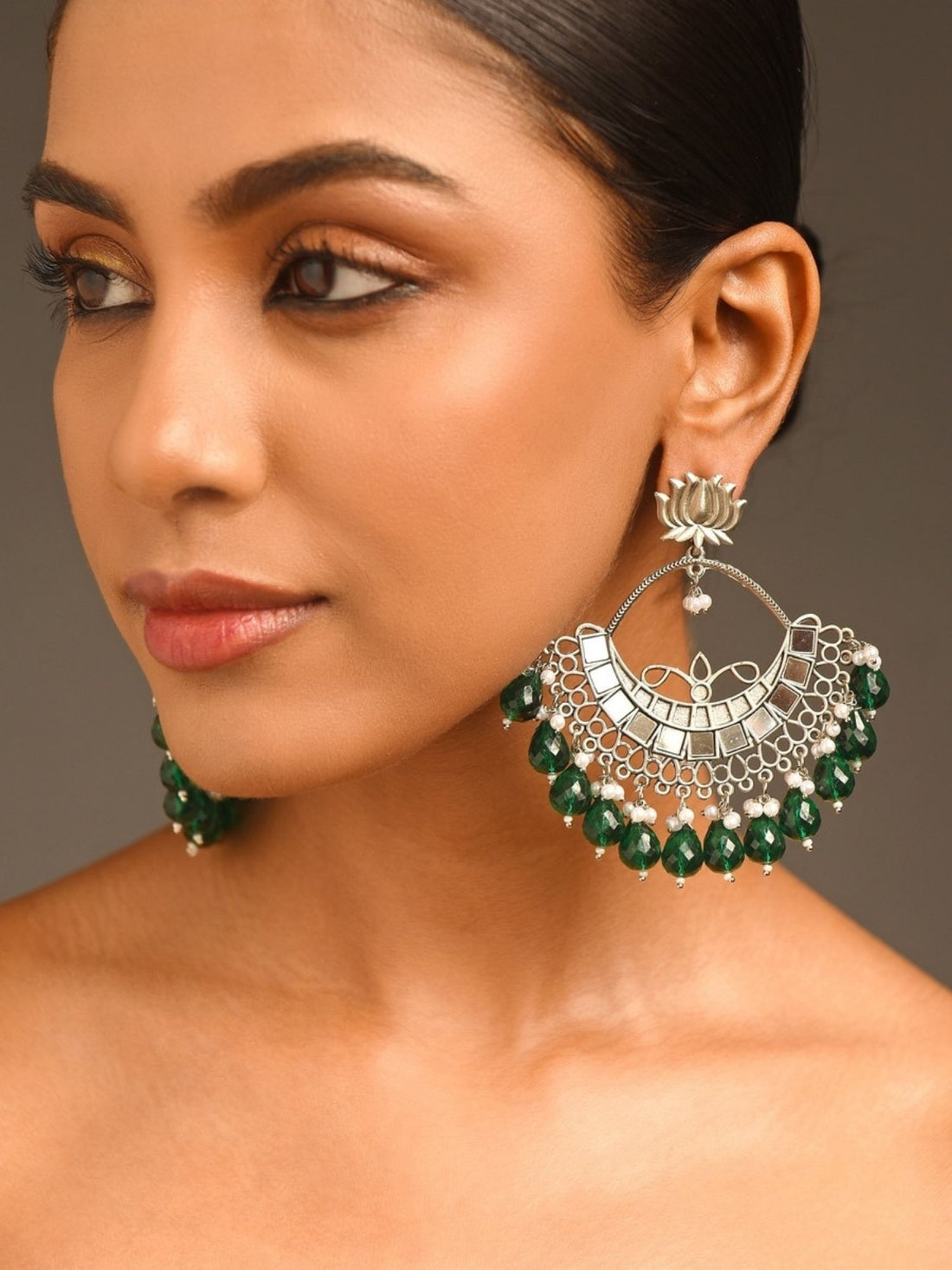 Abdesigns Jewellery Celebrity Style Silver Plated Chandbali Earrings worn by model with green bead details