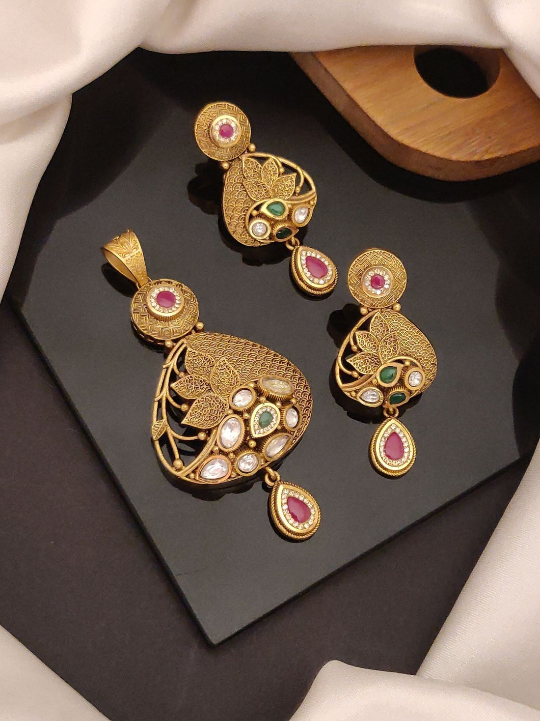 Abdesigns Jewellery Elegant Gold Tone Pendents Set with intricate leaf design and colorful stone accents