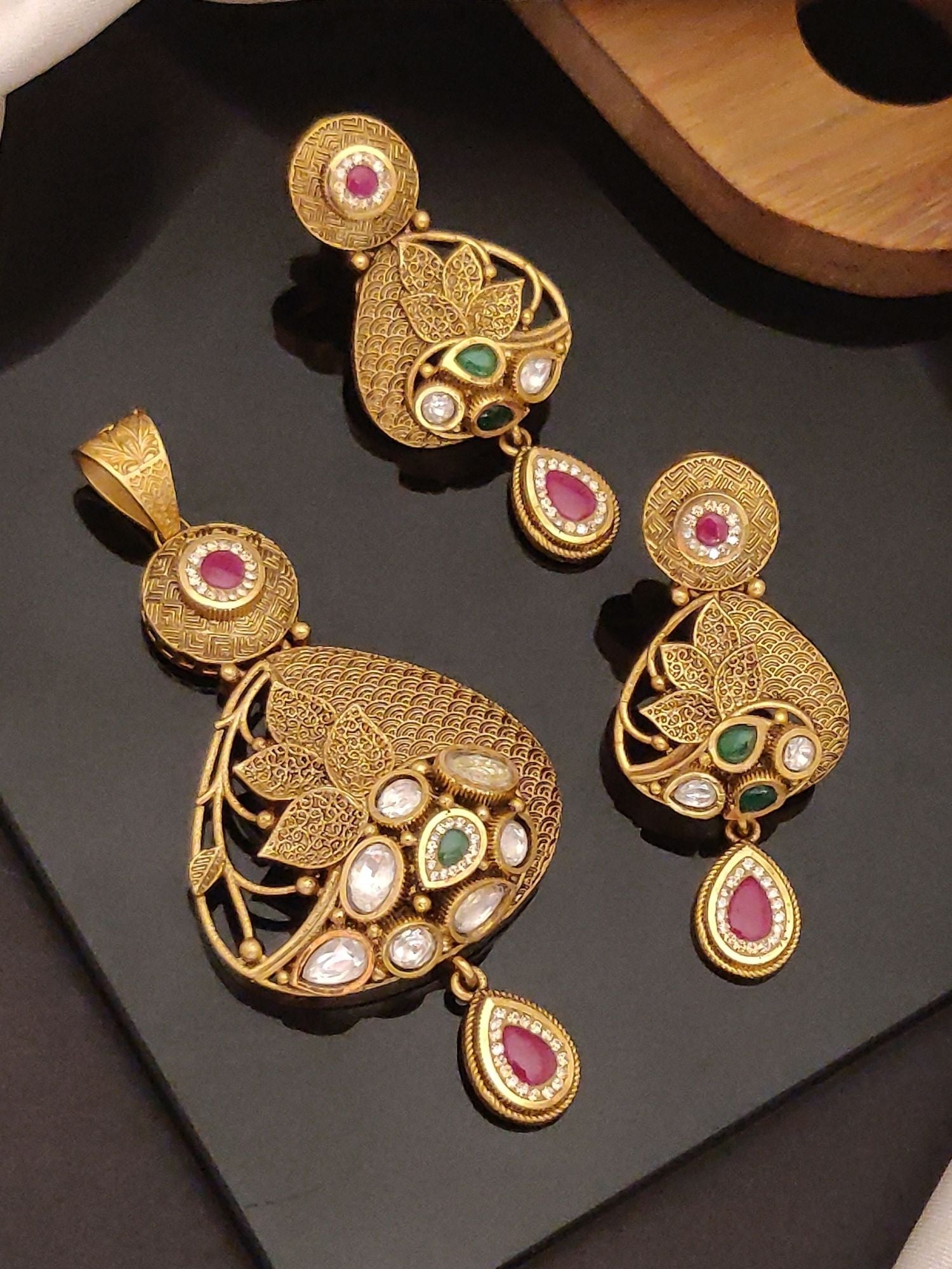 Abdesigns Jewellery Elegant Gold Tone Pendents Set with intricate design and multicolor stones