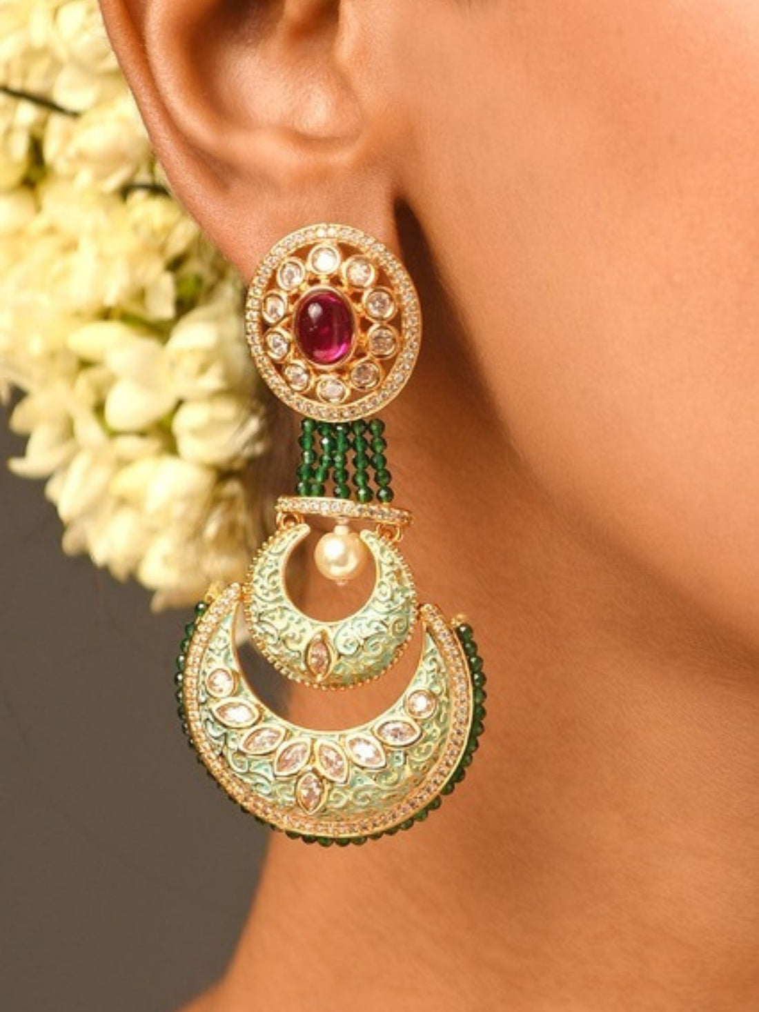 Woman wearing Abdesigns Jewellery Elegant Green Ruby Earrings with intricate gold and green design
