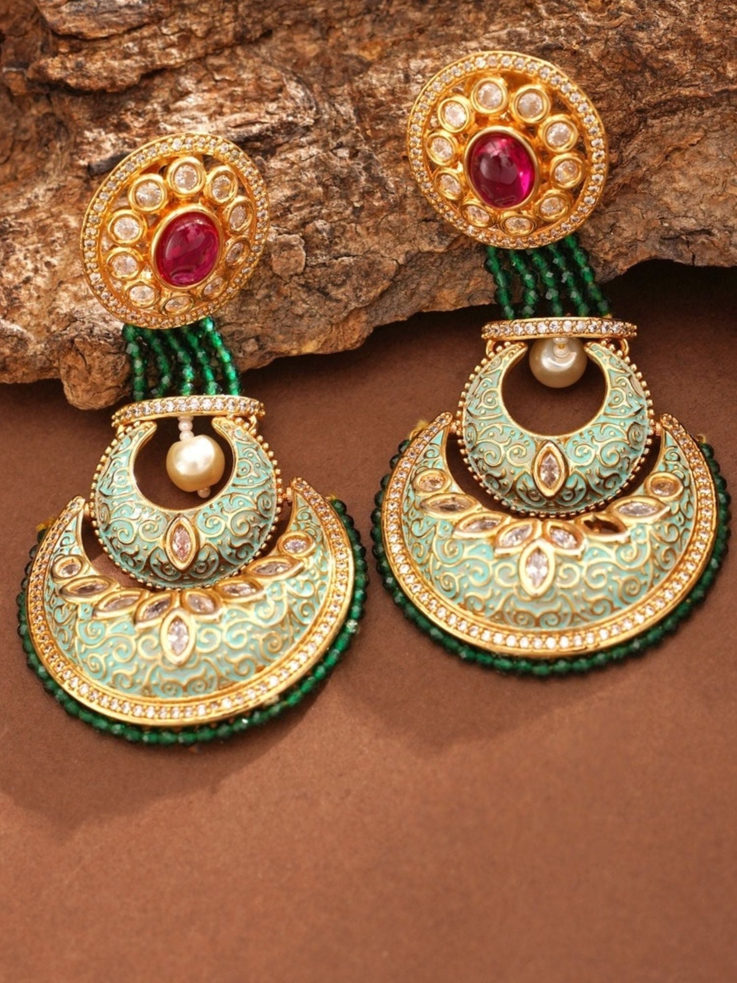 Abdesigns Jewellery Elegant Green Ruby Earrings with gold detailing and pearl accents on brown background
