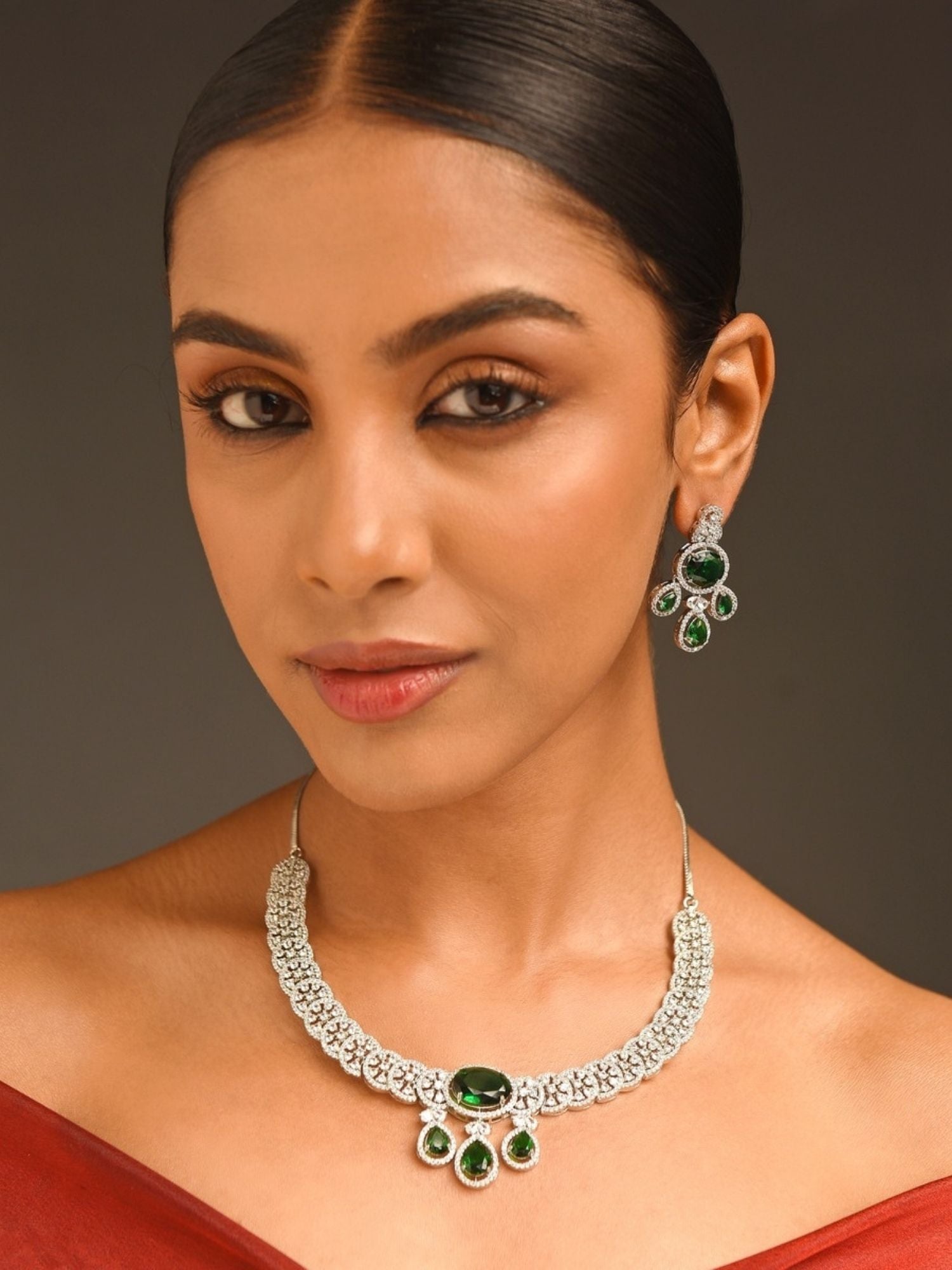Abdesigns Jewellery Elegant Green Stone Necklace Set worn by woman with matching earrings