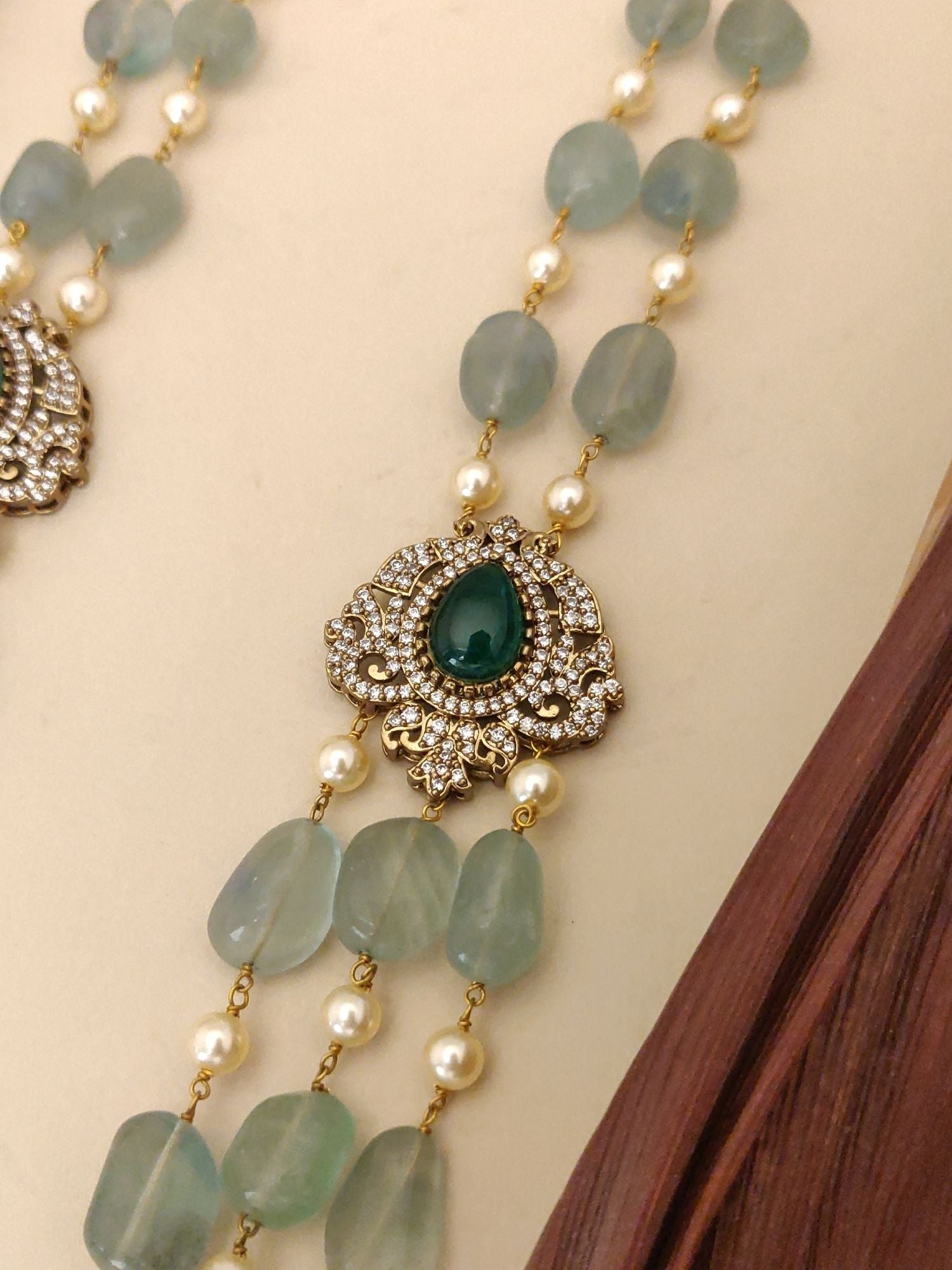 Abdesigns Jewellery Elegant Multi-Strand Beaded Necklace with green stones pearls and decorative centerpiece