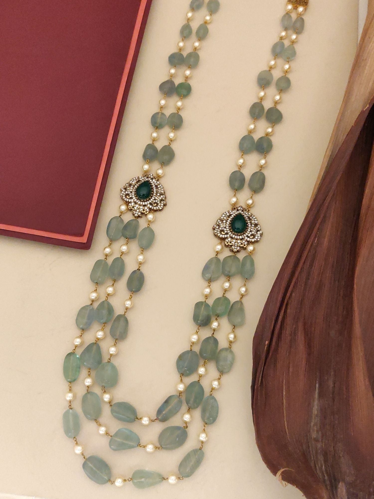 Abdesigns Jewellery Elegant Multi-Strand Beaded Necklace with green and pearl beads and decorative pendants