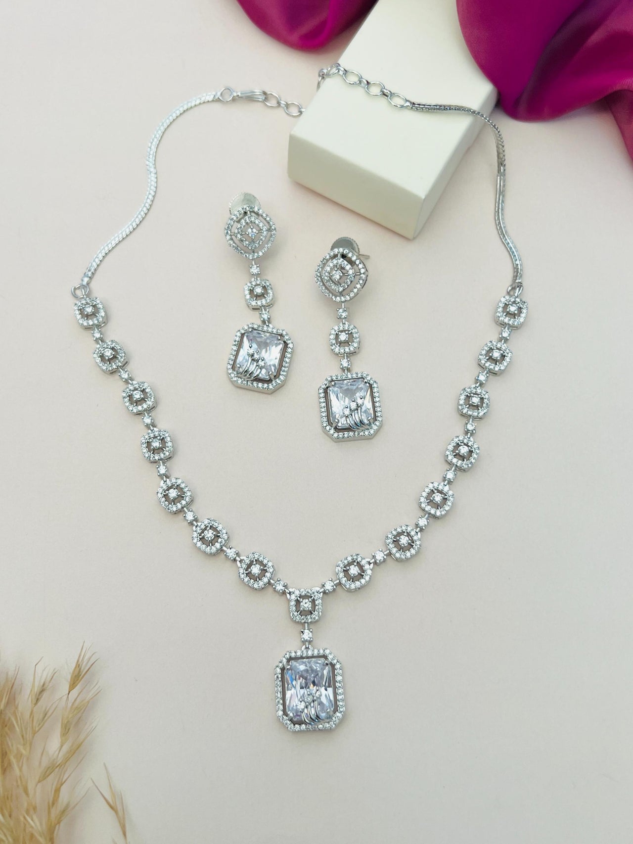 Abdesigns Jewellery Elegant Necklace with Blue Pendant Set featuring a silver chain and matching earrings