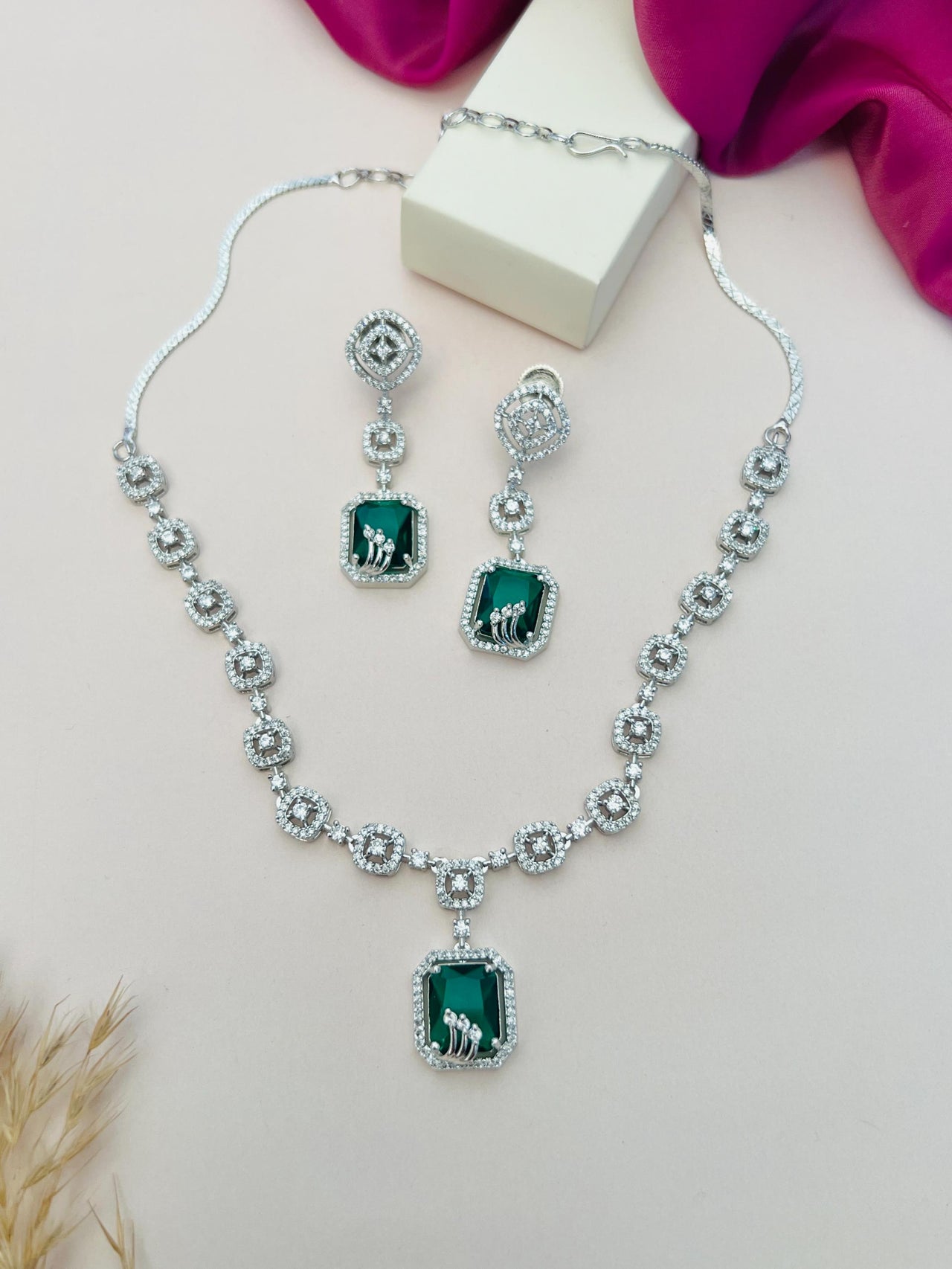 Abdesigns Jewellery Elegant Necklace with Blue Pendant Set featuring silver chain and matching earrings with blue stones