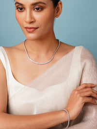 Thumbnail for Abdesigns jewellery Elegant Silver Bracelet for Women worn on wrist with matching necklace and ivory outfit