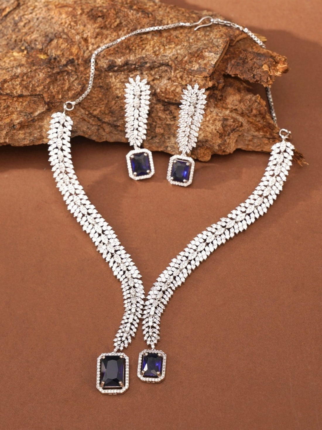 Abdesigns Jewellery Elegant Swarovski Necklace Set worn by woman with matching earrings featuring blue gemstones