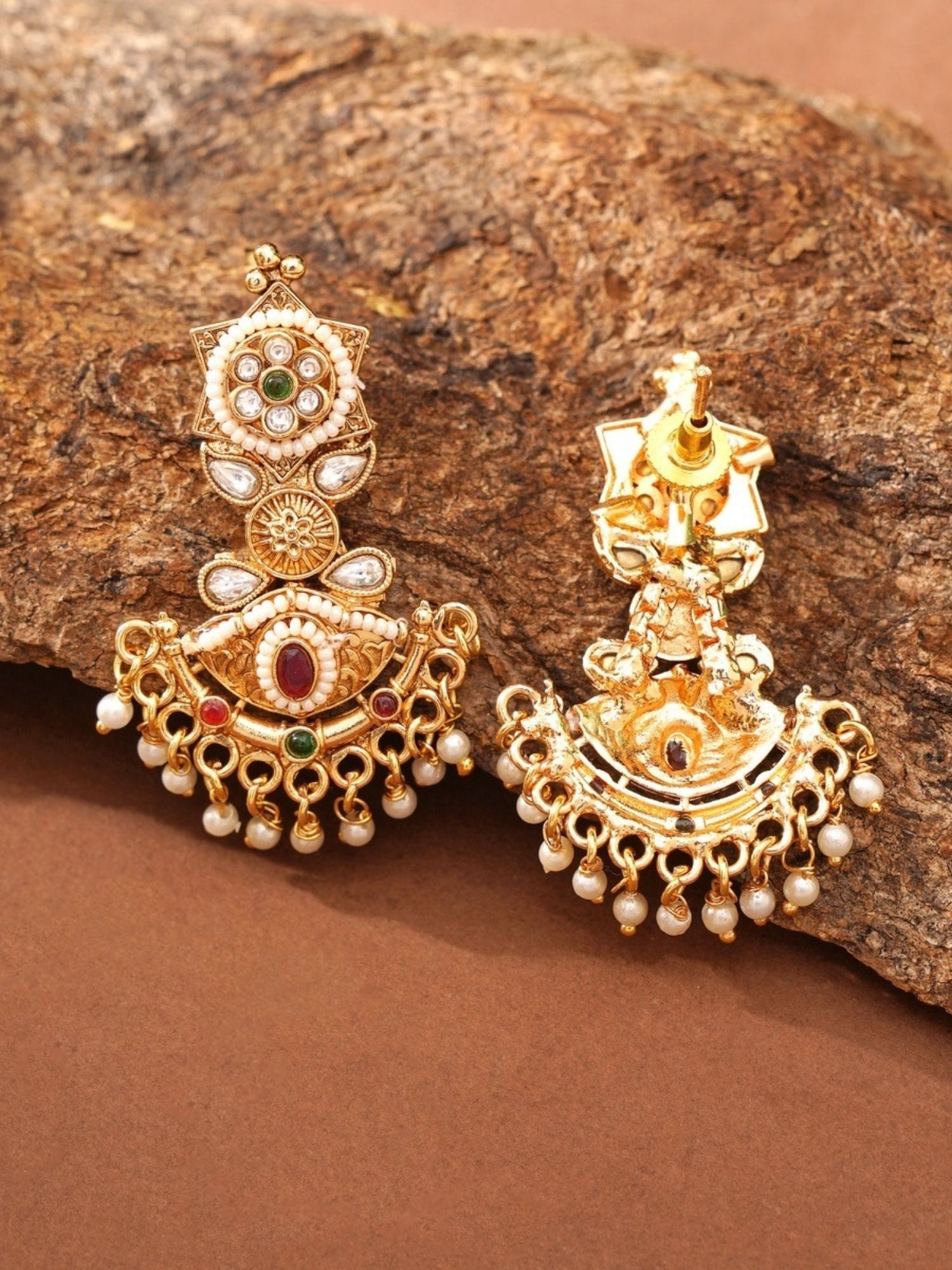 Abdesigns Jewellery Elegant Traditional Necklace Set with gold tone, pearls, and colorful stones on brown background