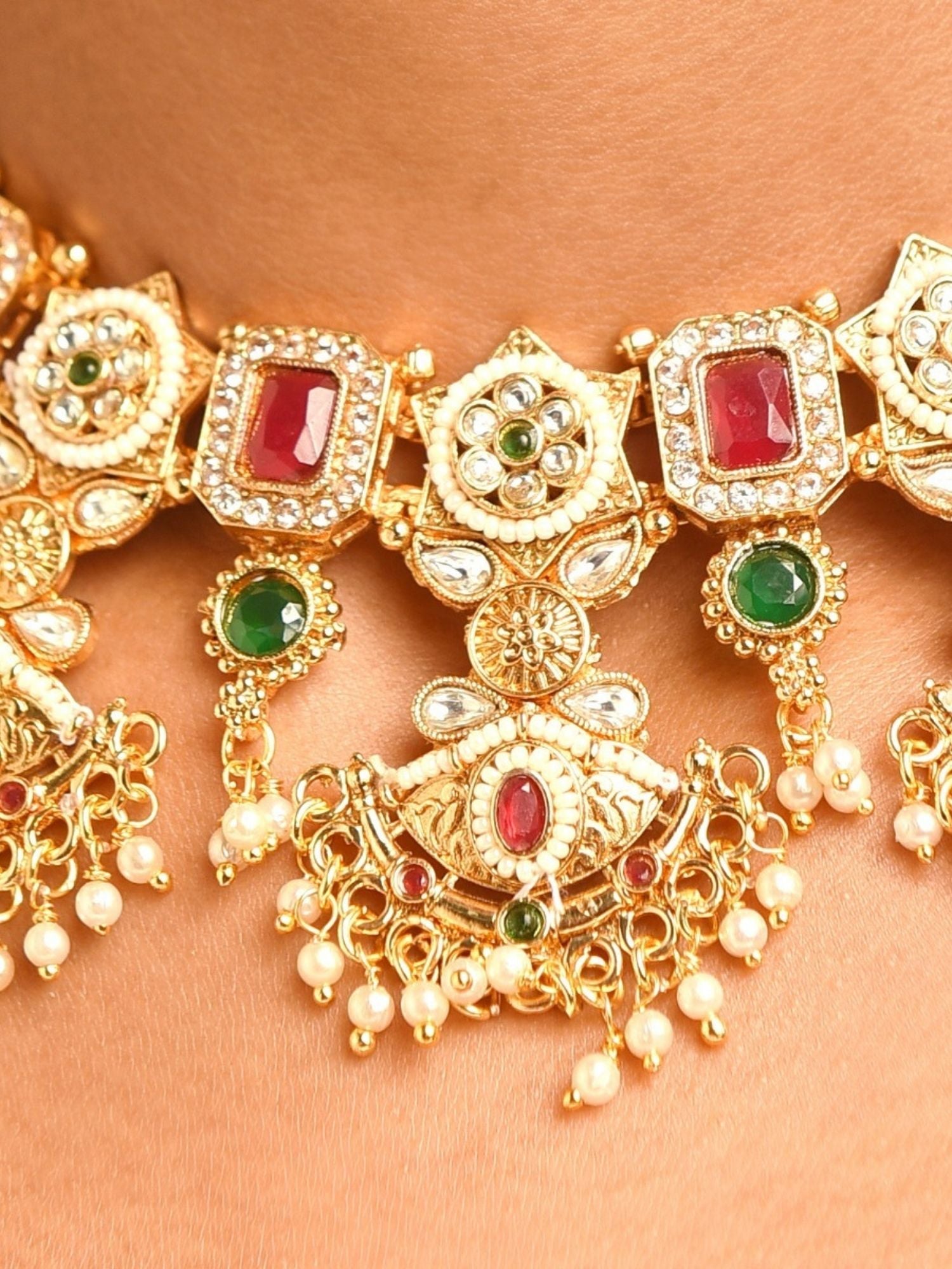 Abdesigns Jewellery Elegant Traditional Necklace Set with gold finish red and green stones and pearl detailing