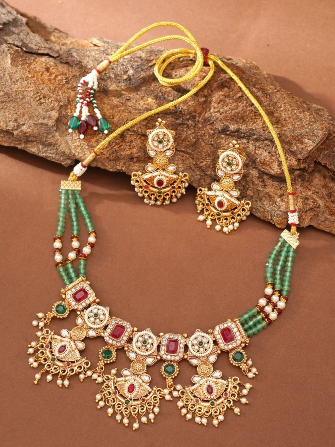 Abdesigns Jewellery Elegant Traditional Necklace Set with green and gold detailing worn with matching earrings