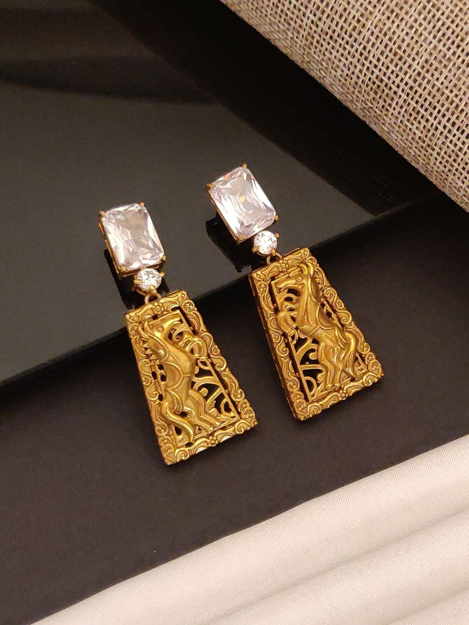 Abdesigns Jewellery Gold Antique Style Earrings with Gemstone featuring intricate lion design and rectangular crystals