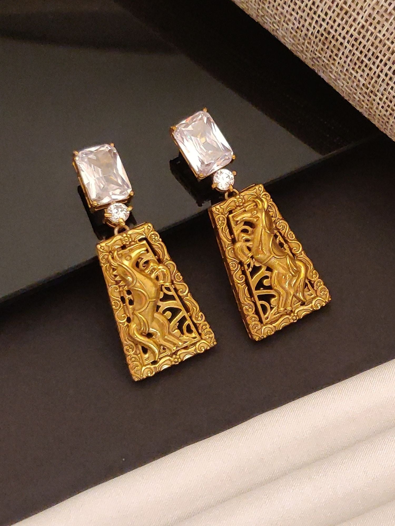 Abdesigns Jewellery Gold Antique Style Earrings with Gemstone featuring intricate horse design and rectangular clear stones