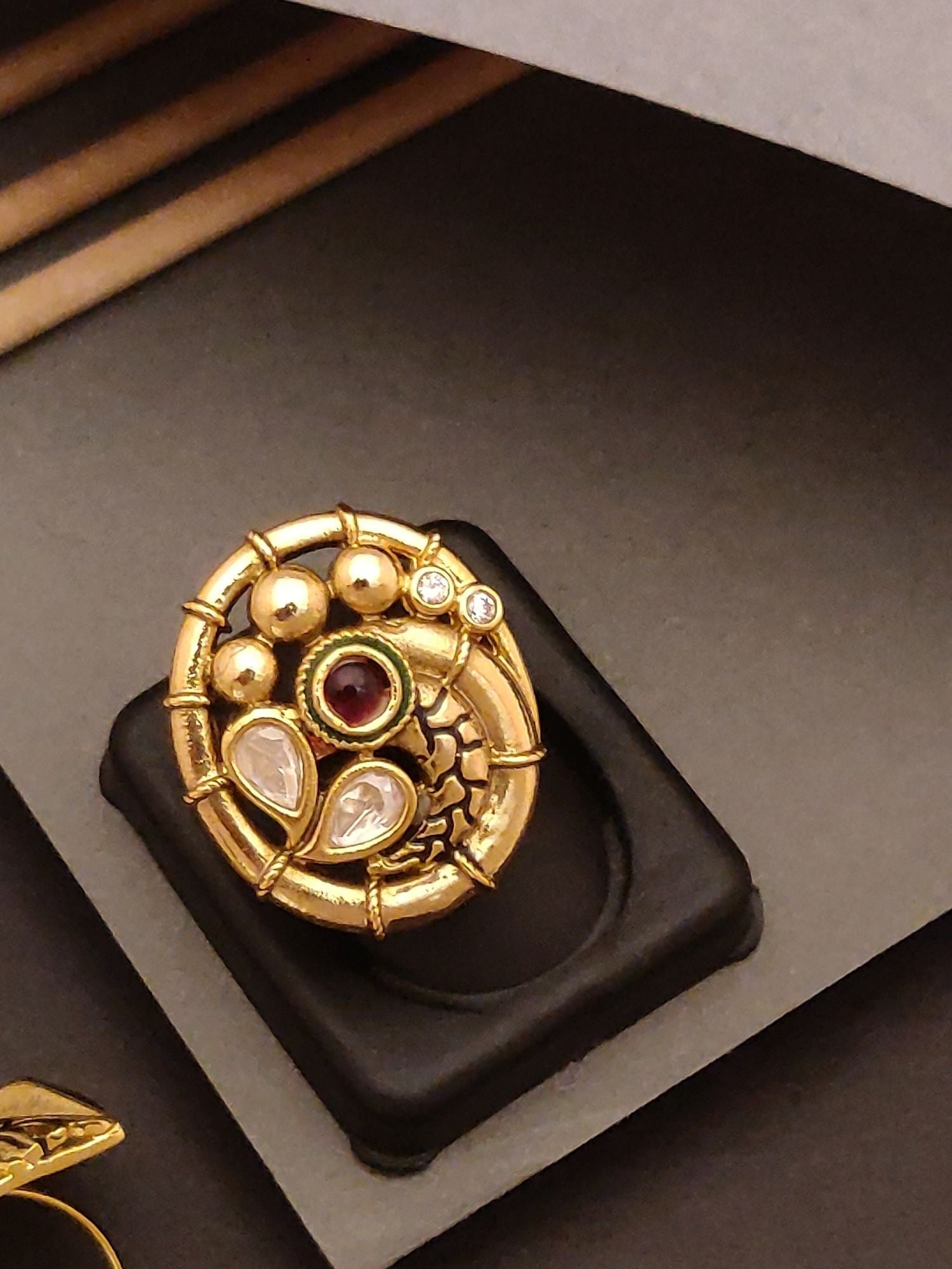 Abdesigns Jewellery Gold-Plated Elegant Designer Ring with intricate gold beads and gemstone accents