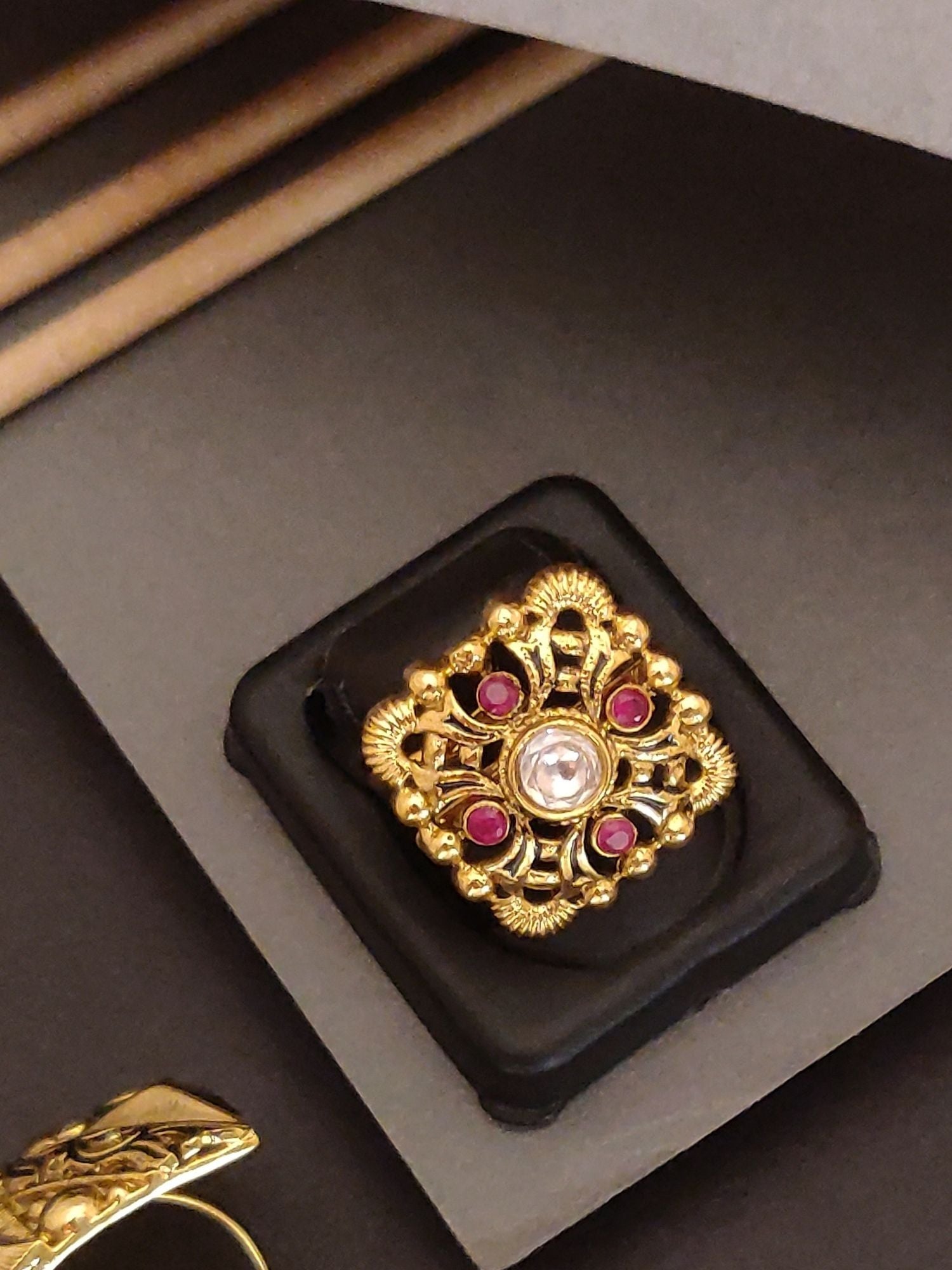 Abdesigns Jewellery Gold-Plated Traditional Cocktail Ring with red and white stones in intricate design