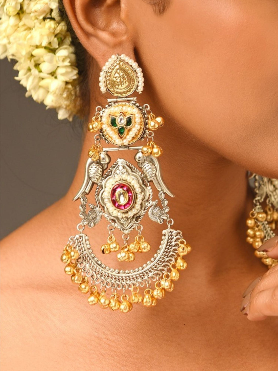 Abdesigns jewellery Gold & Silver Plated Statement Earrings worn by a woman with floral hair accessory