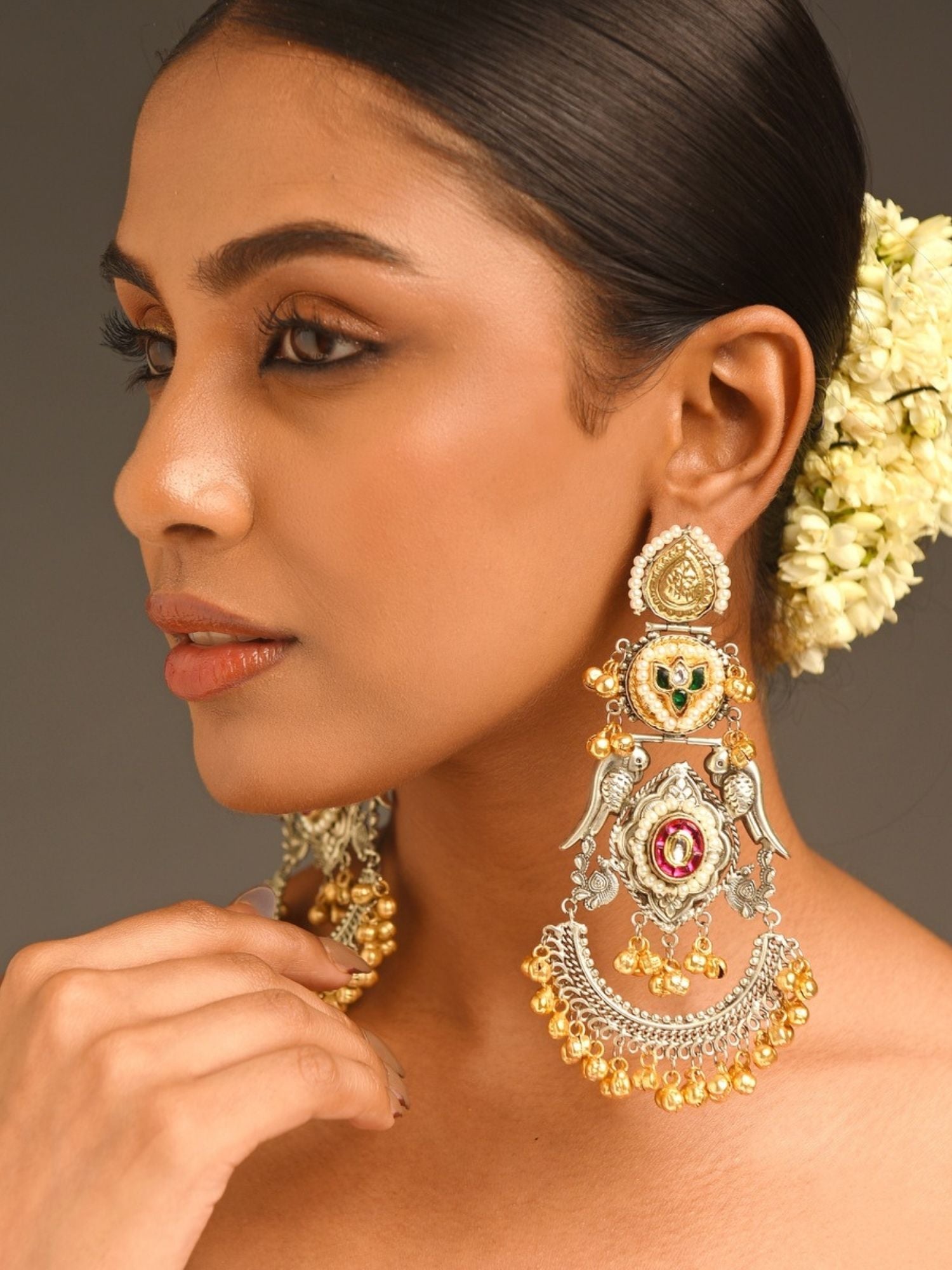 Abdesigns jewellery Gold & Silver Plated Statement Earrings worn by a woman with floral hair accessory