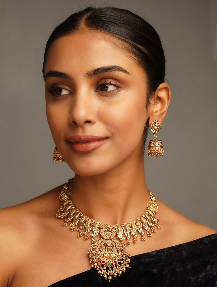 Abdesigns Jewellery Gold-Tone Traditional Necklace Set worn by a woman with matching earrings