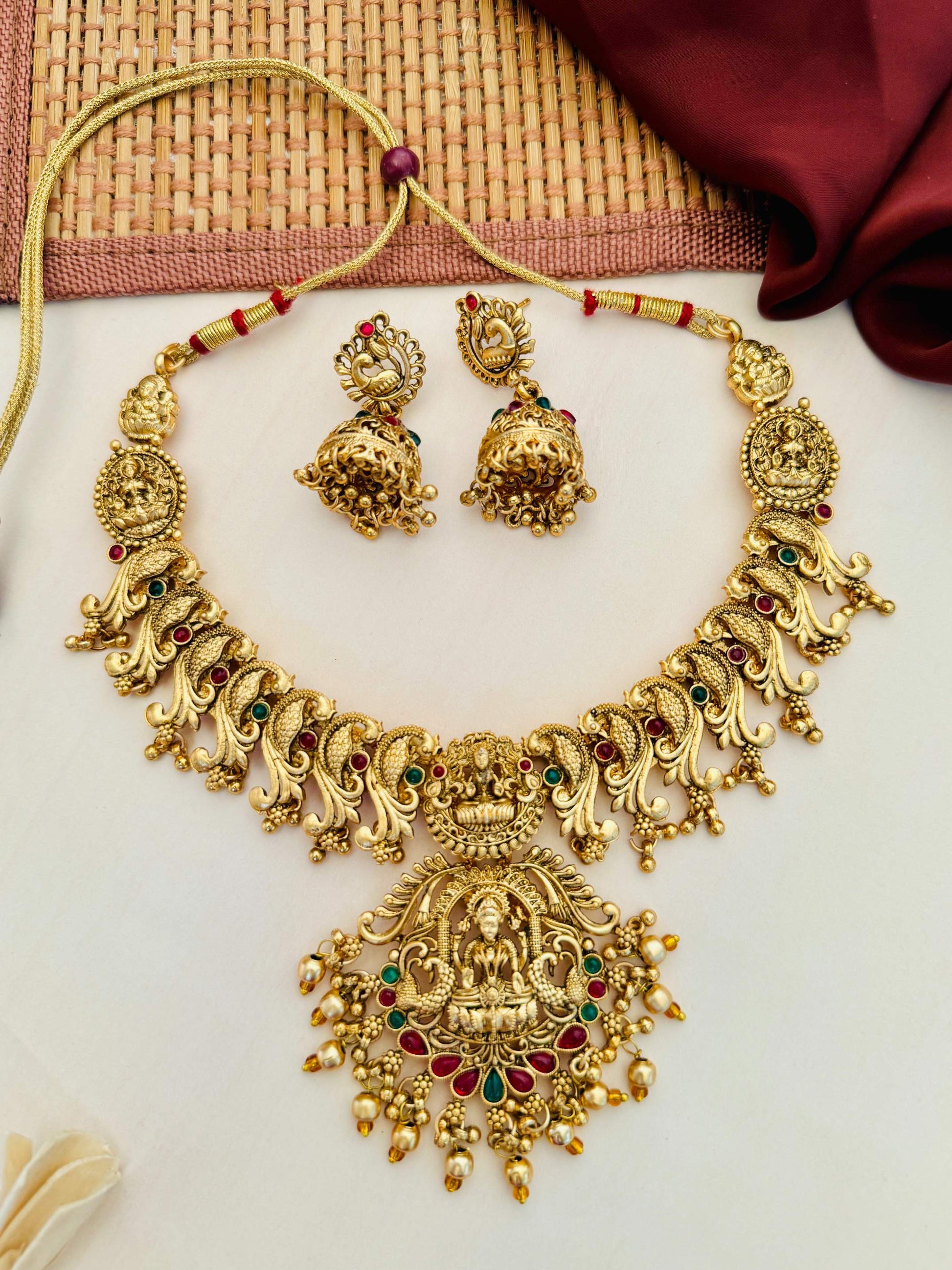 Abdesigns Jewellery Gold-Tone Traditional Necklace Set with intricate detailing and matching earrings