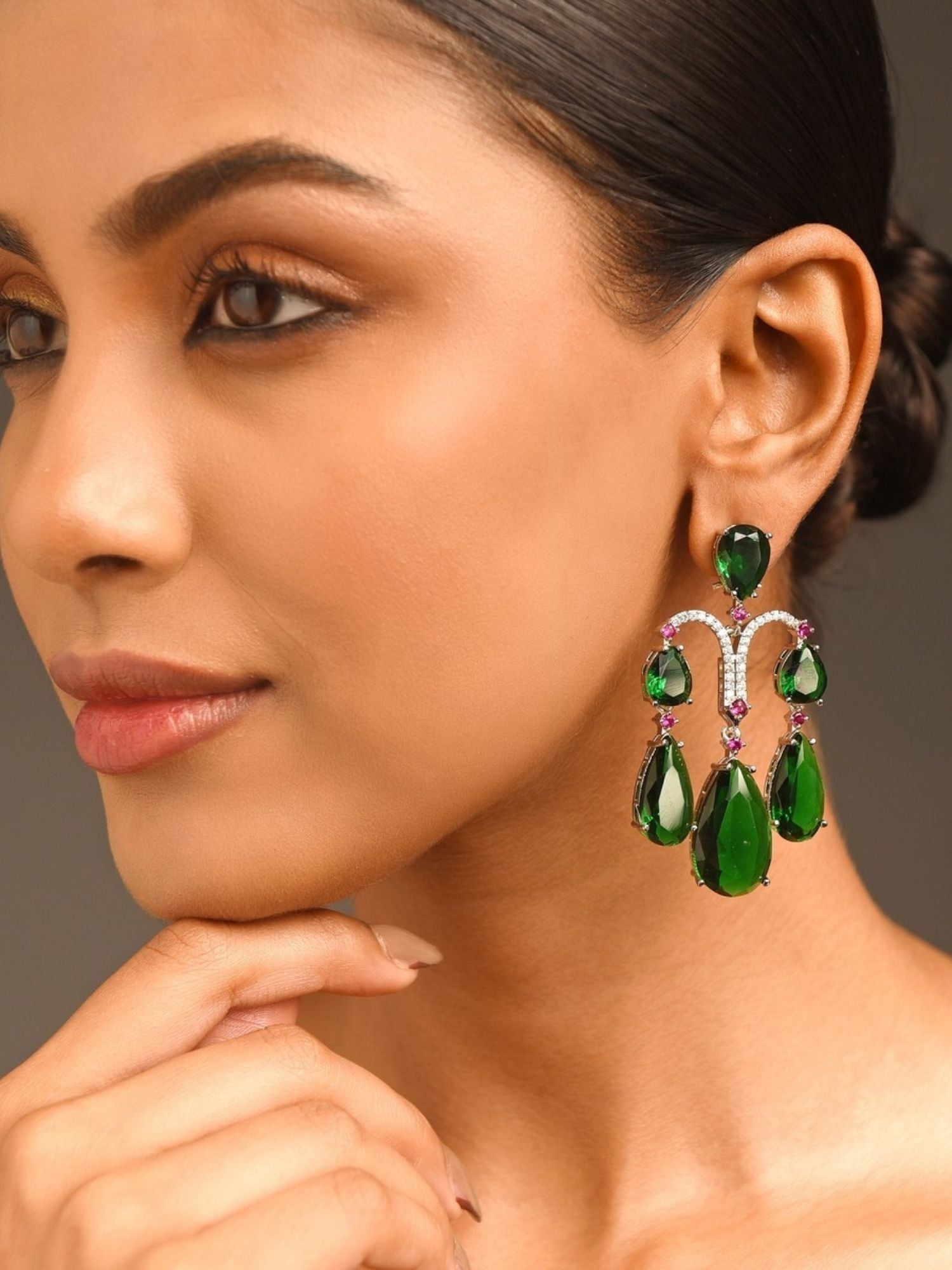 Abdesigns Jewellery Green Teardrop Earrings with Crystals worn by a woman showcasing elegant green gemstone design