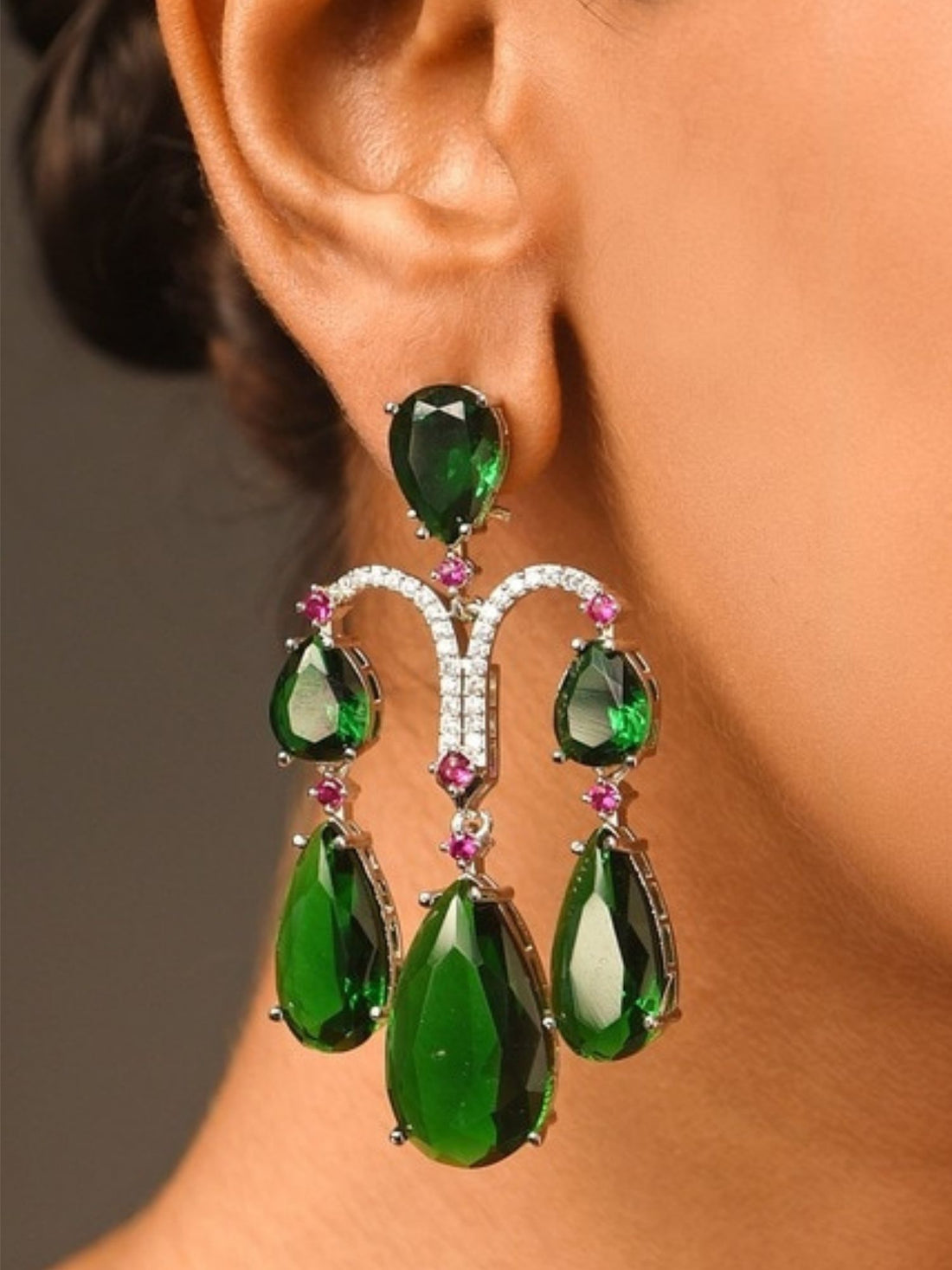 Abdesigns Jewellery Green Teardrop Earrings with Crystals worn by a woman showcasing elegant green gemstone design