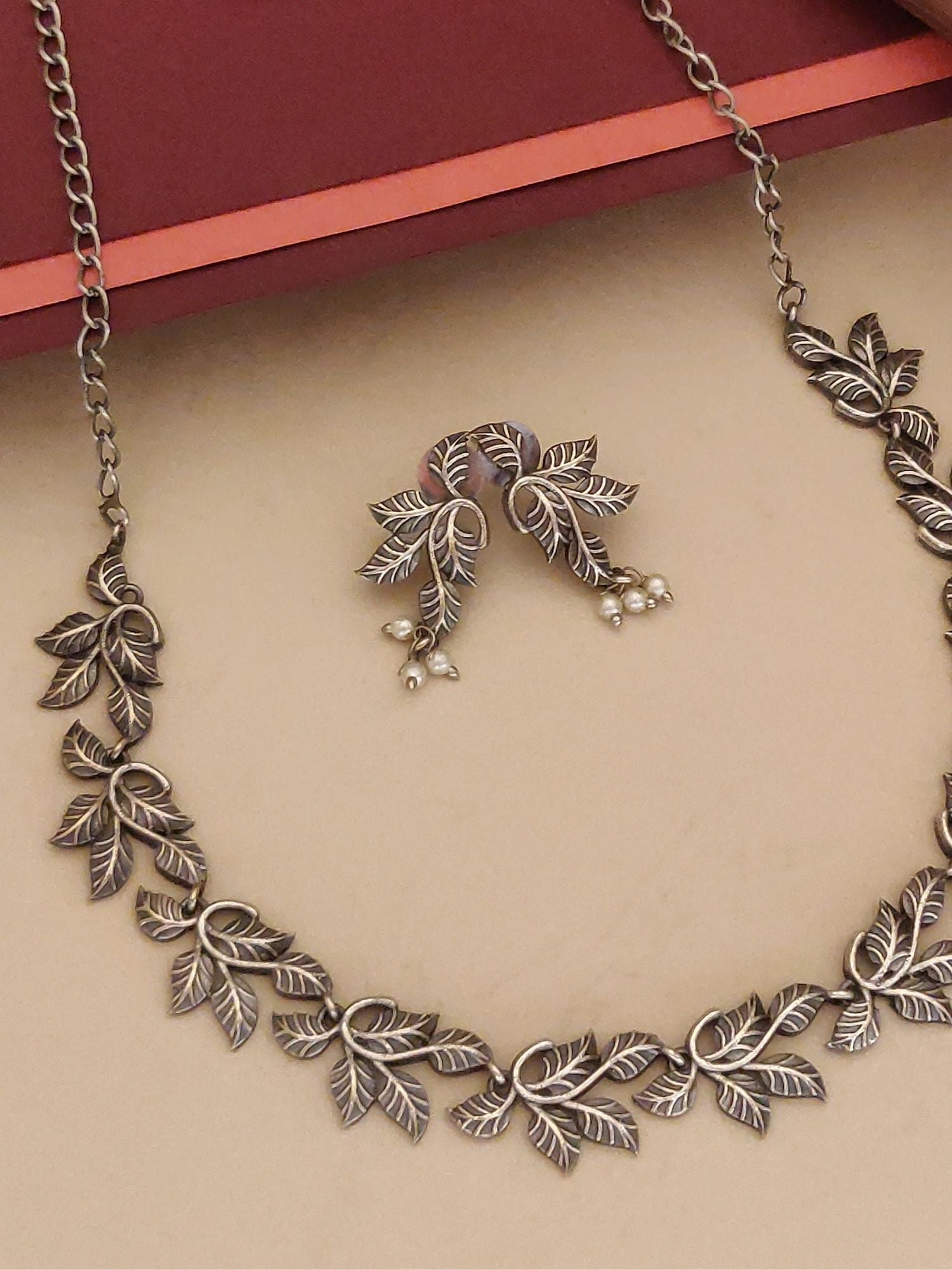 Abdesigns Jewellery Leaf Pattern Silver Necklace Set with intricate silver leaf design and matching earrings