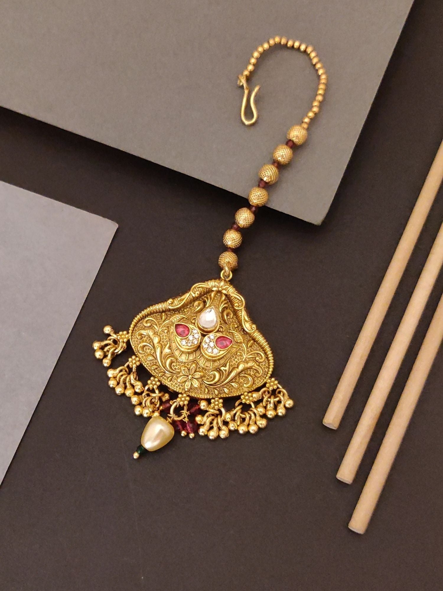 Abdesigns Jewellery Maangtikka Elegant Gold-Tone Design with intricate detailing and pearl accents