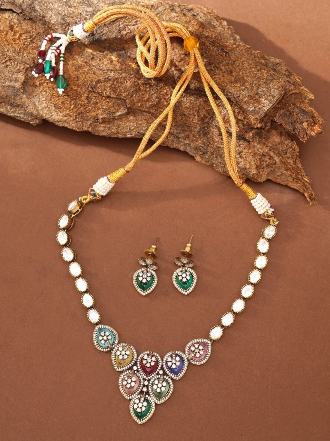 Abdesigns Jewellery Multicolor Heart Pendant Necklace worn by a woman with matching earrings