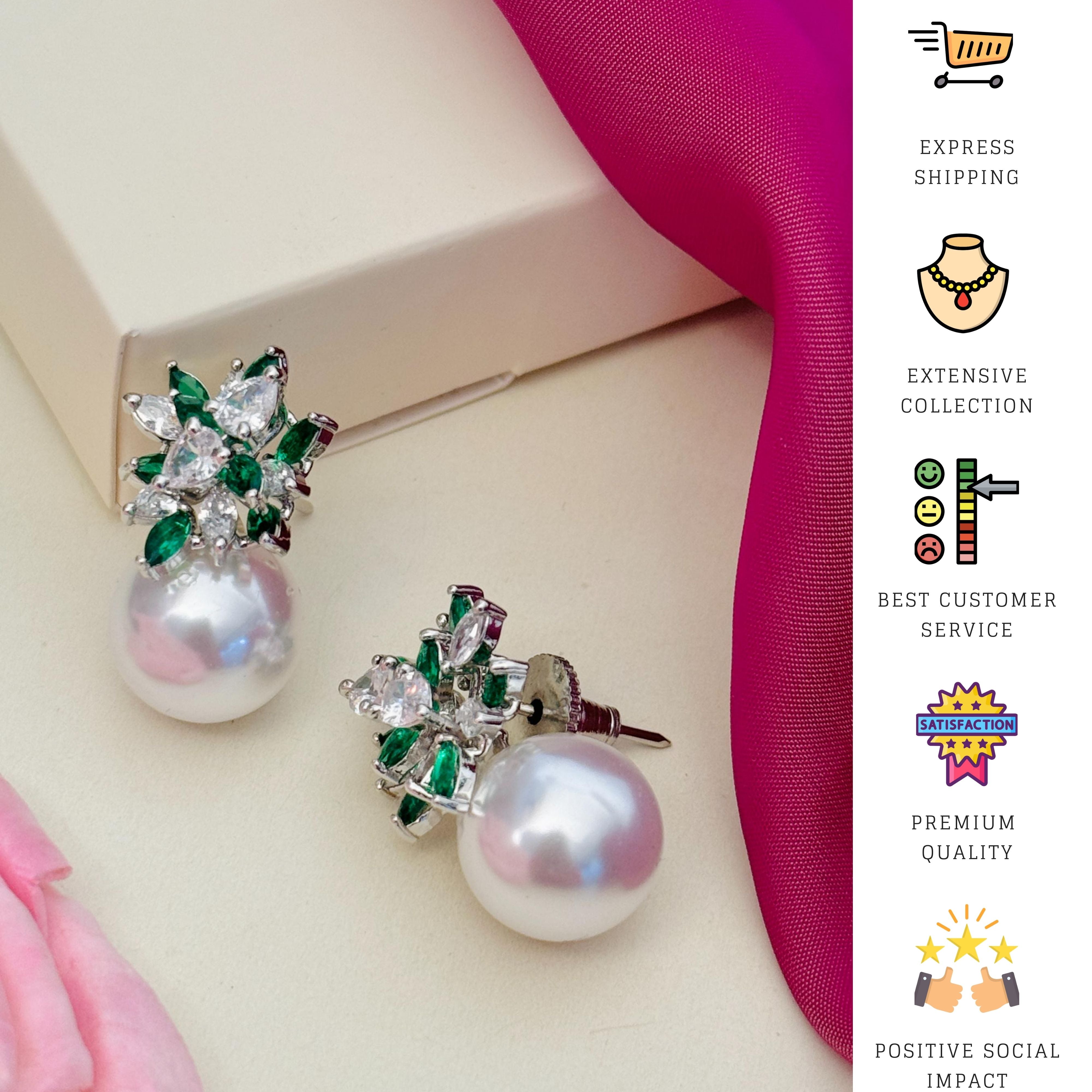 Abdesigns Jewellery Pearl & Green Leaf Earrings with white pearls and green crystal leaves
