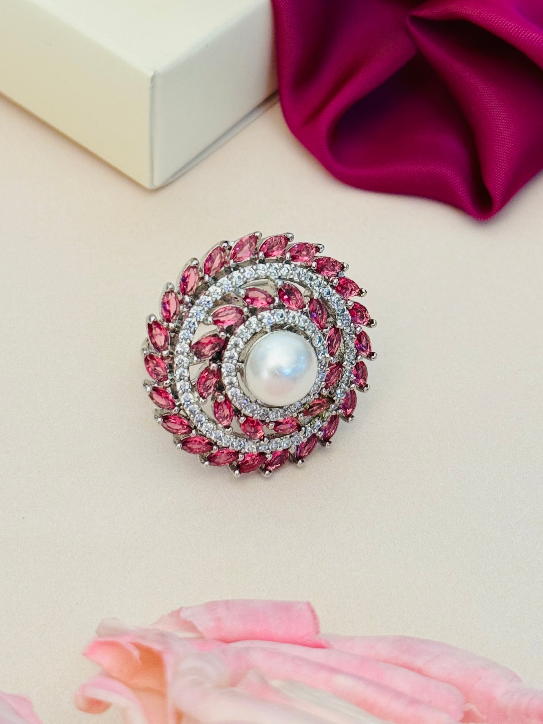 Abdesigns Jewellery Pearl & Pink Stone Silver Ring with a central pearl and surrounding pink stones