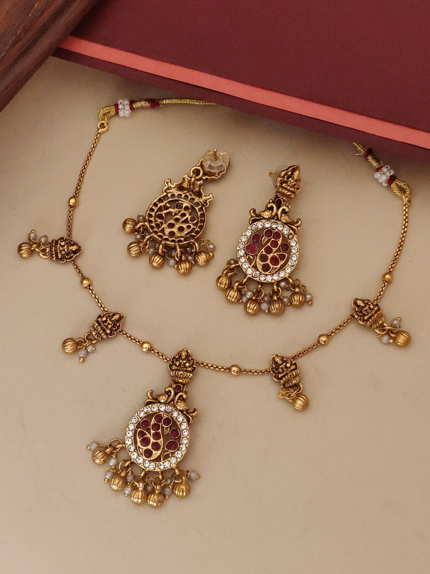 Abdesigns Jewellery Pendents Chain with Antique Gold Finish featuring intricate traditional design and red stone accents