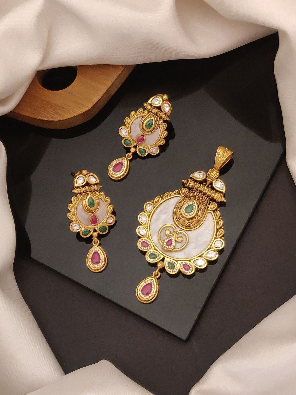 Abdesigns Jewellery Pendents Chain with Multicolor Stones featuring gold-tone intricate pendant and matching earrings set
