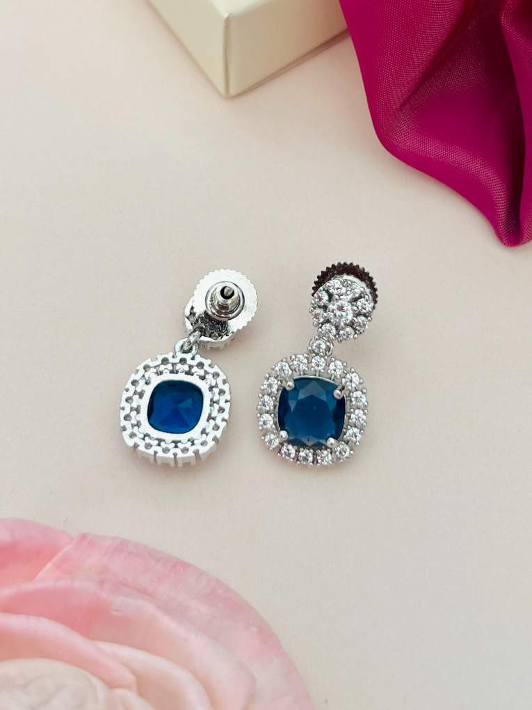 Abdesigns Jewellery Ruby Drop Earrings with Cubic Zirconia featuring blue stones surrounded by clear crystals