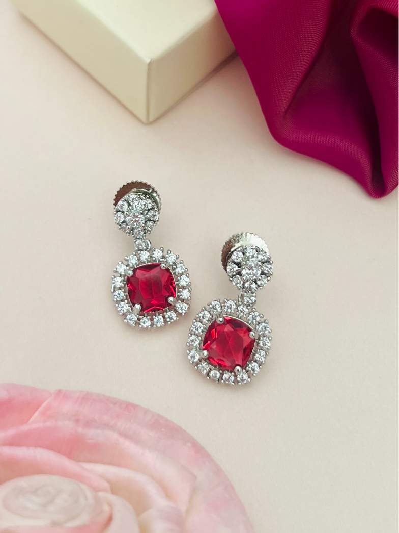 Abdesigns Jewellery Ruby Drop Earrings with Cubic Zirconia featuring red stones surrounded by sparkling clear crystals