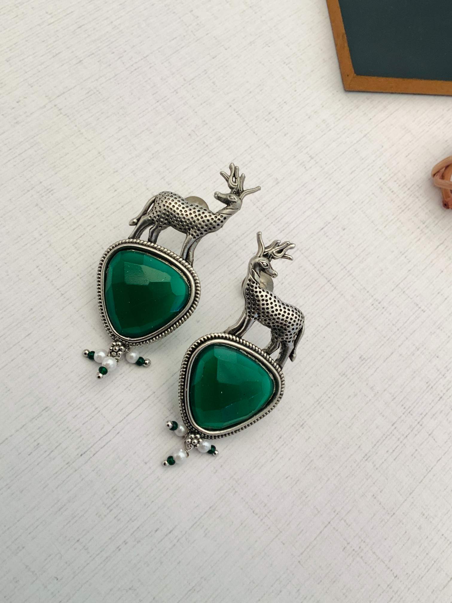 Abdesigns Jewellery Silver Deer Green Stone Earrings with intricate deer design and green stone centerpiece