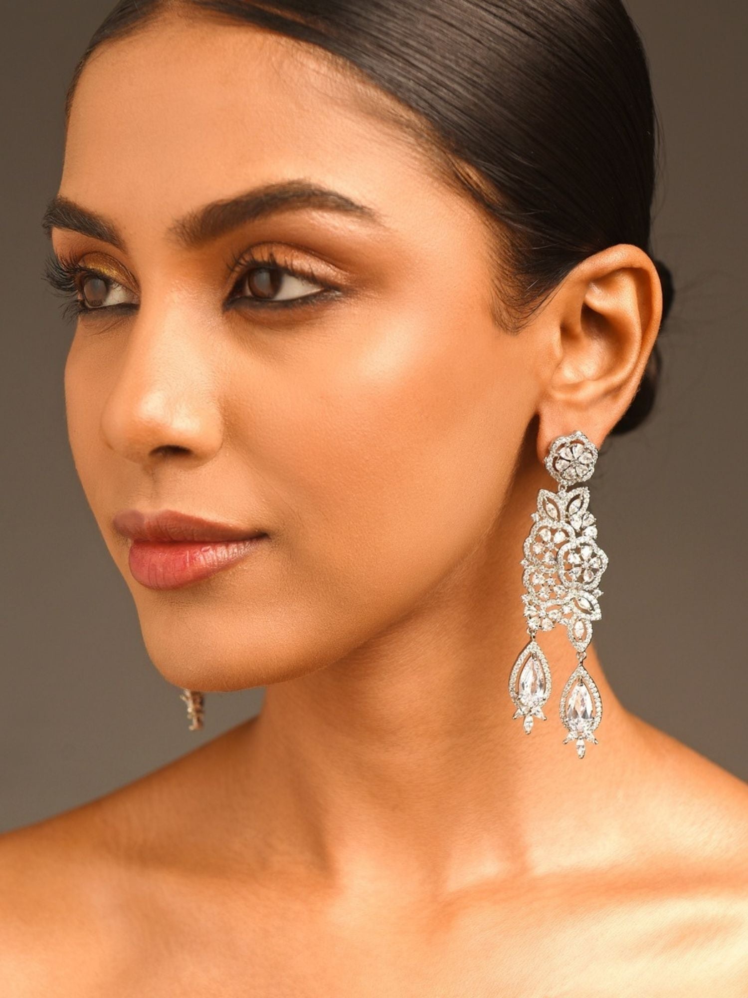 Woman wearing Abdesigns Jewellery Silver Floral Drop Earrings with intricate floral and teardrop design