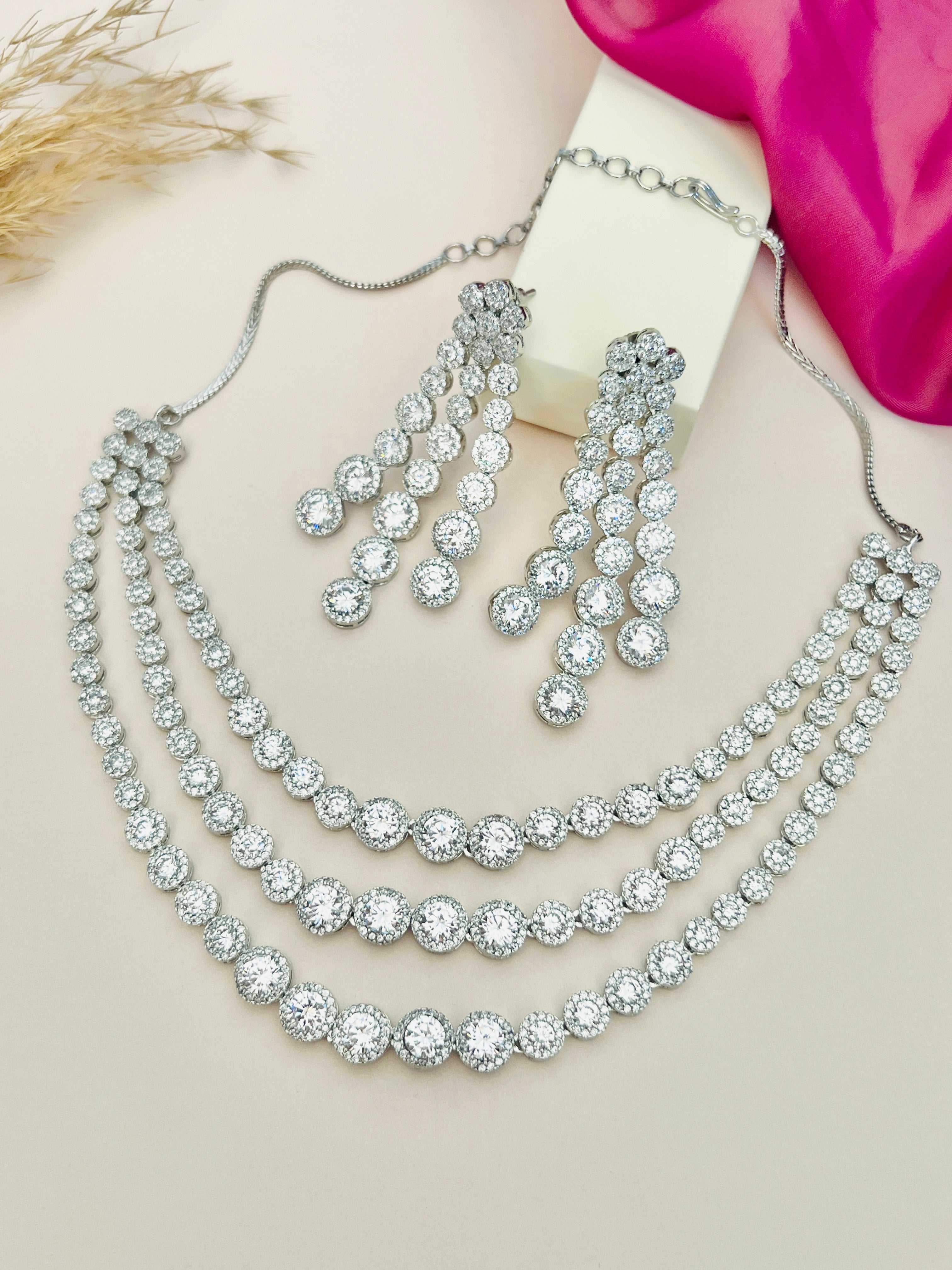 Silver Plated American Diamond Multilayer Necklace Set By Abdesigns Jewellery. Three strand necklace with matching earrings
